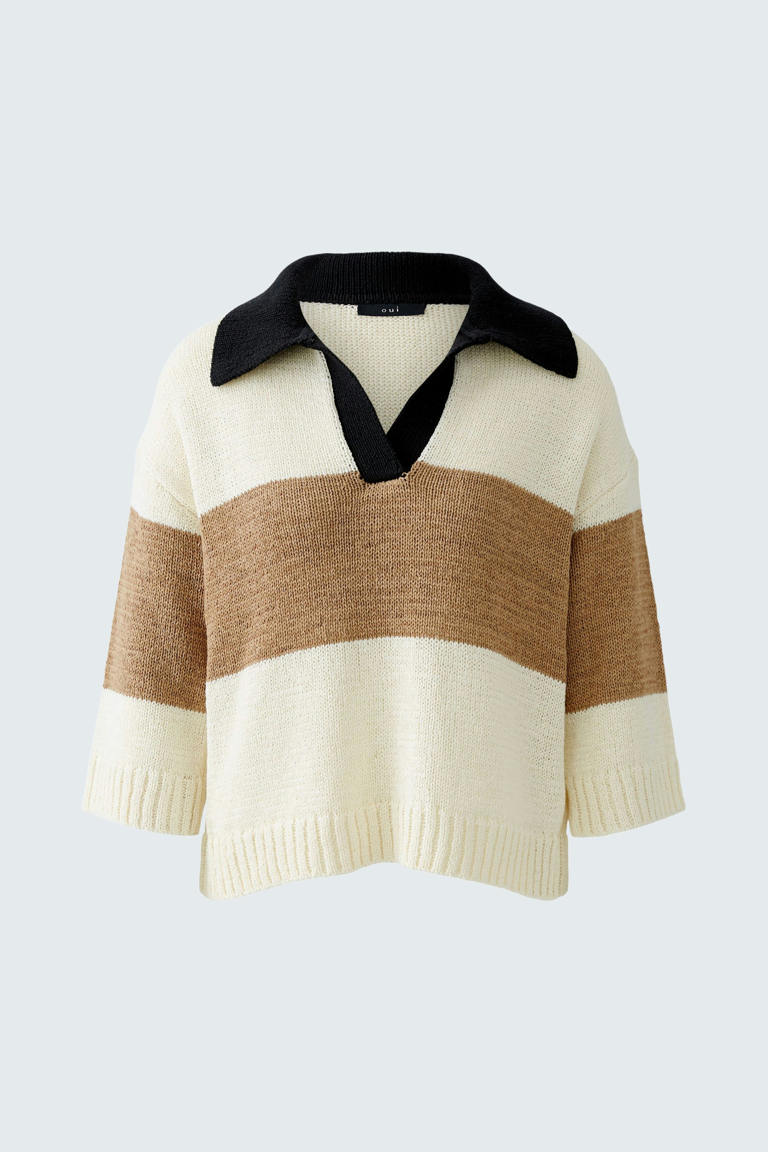Casual women's pullover: A relaxed fit pullover with a black collar and striped design in cream and brown.