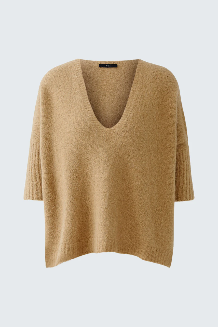 Bequemer Damen-Pullover in Beige mit V-Ausschnitt und lässigem Schnitt.