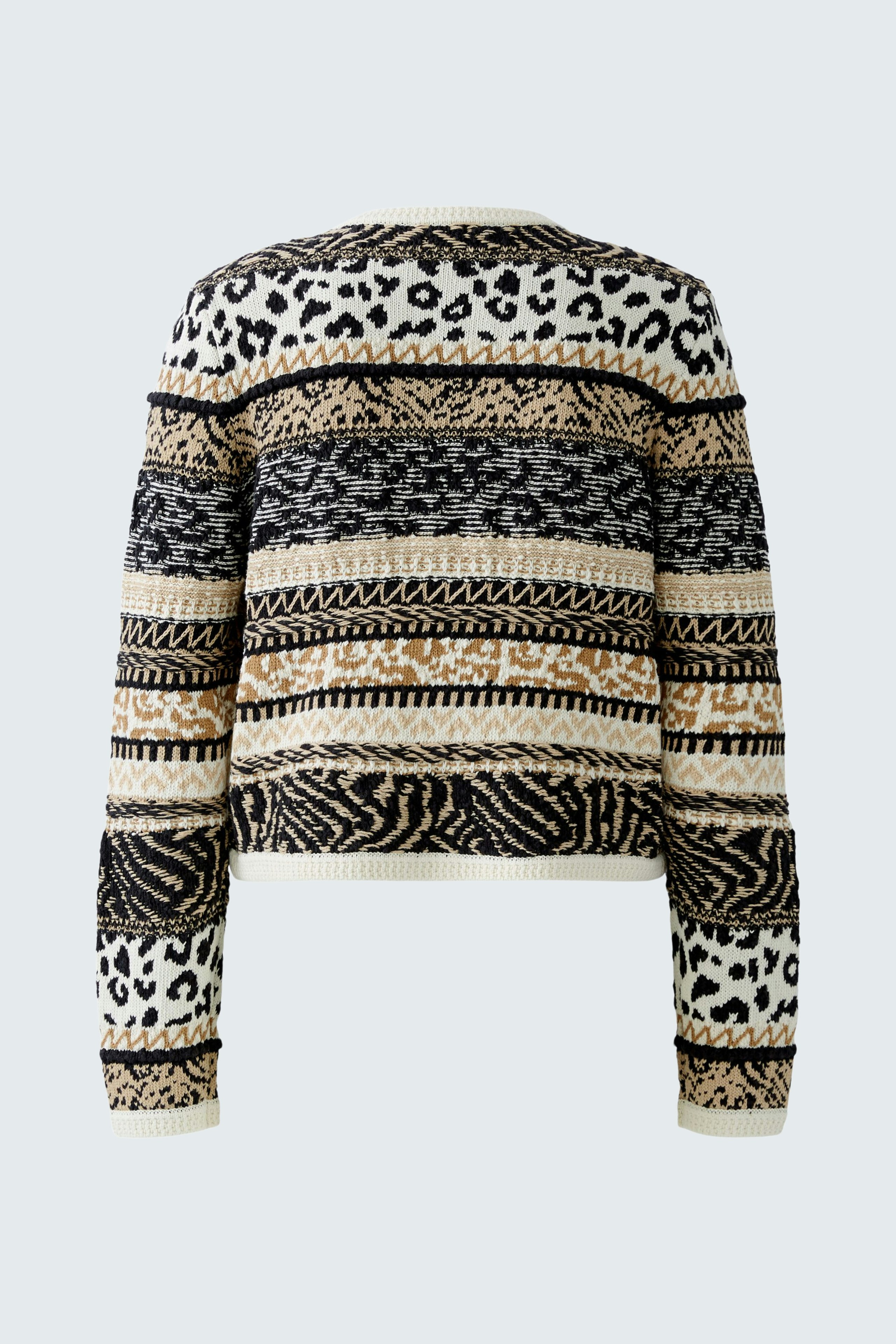 Casual women's cardigan: A woman in a colorful patterned pullover with a relaxed fit.