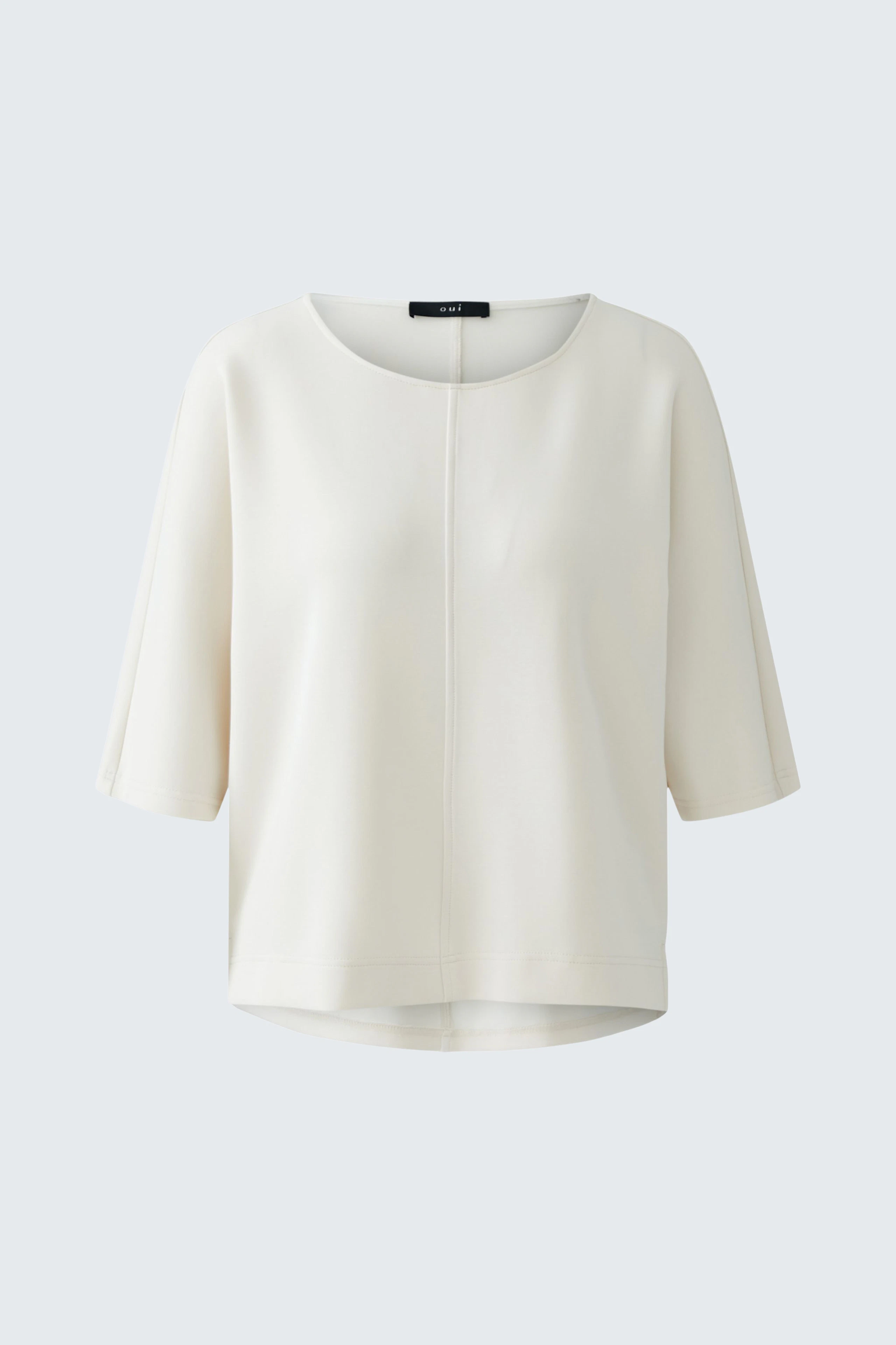 Casual women's pullover: A relaxed-fit white pullover with short sleeves and a round neckline.