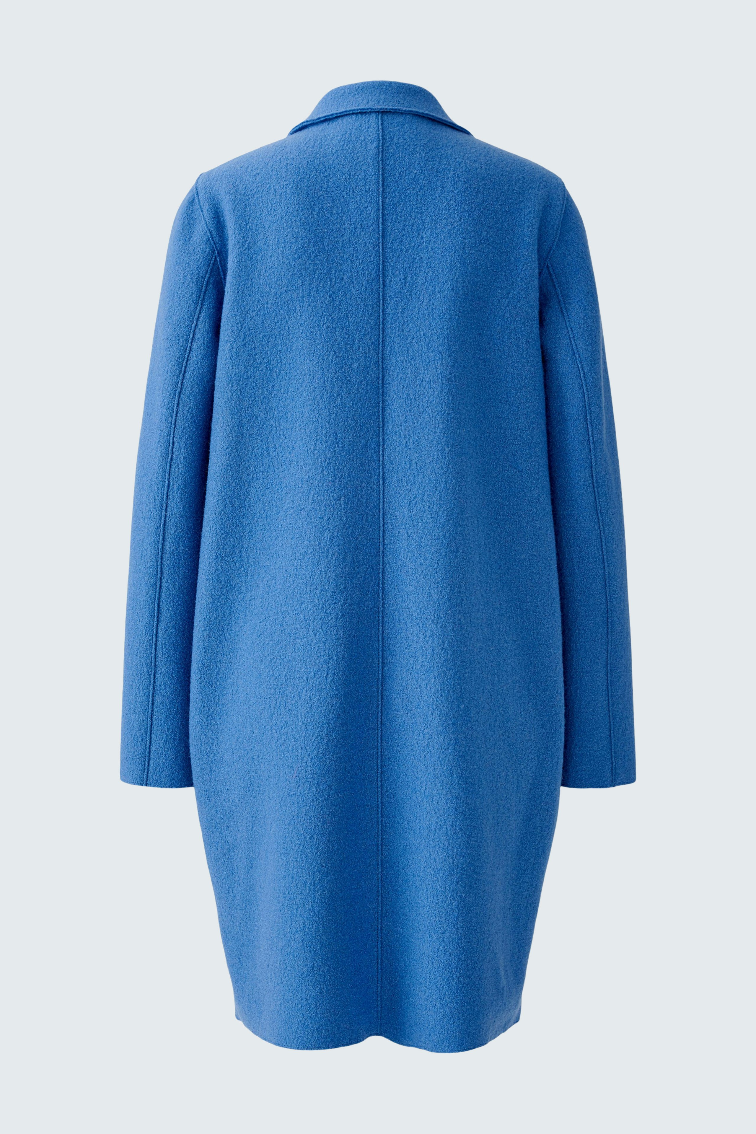 Cozy women's wool coat in vibrant blue, featuring a relaxed fit and classic collar.