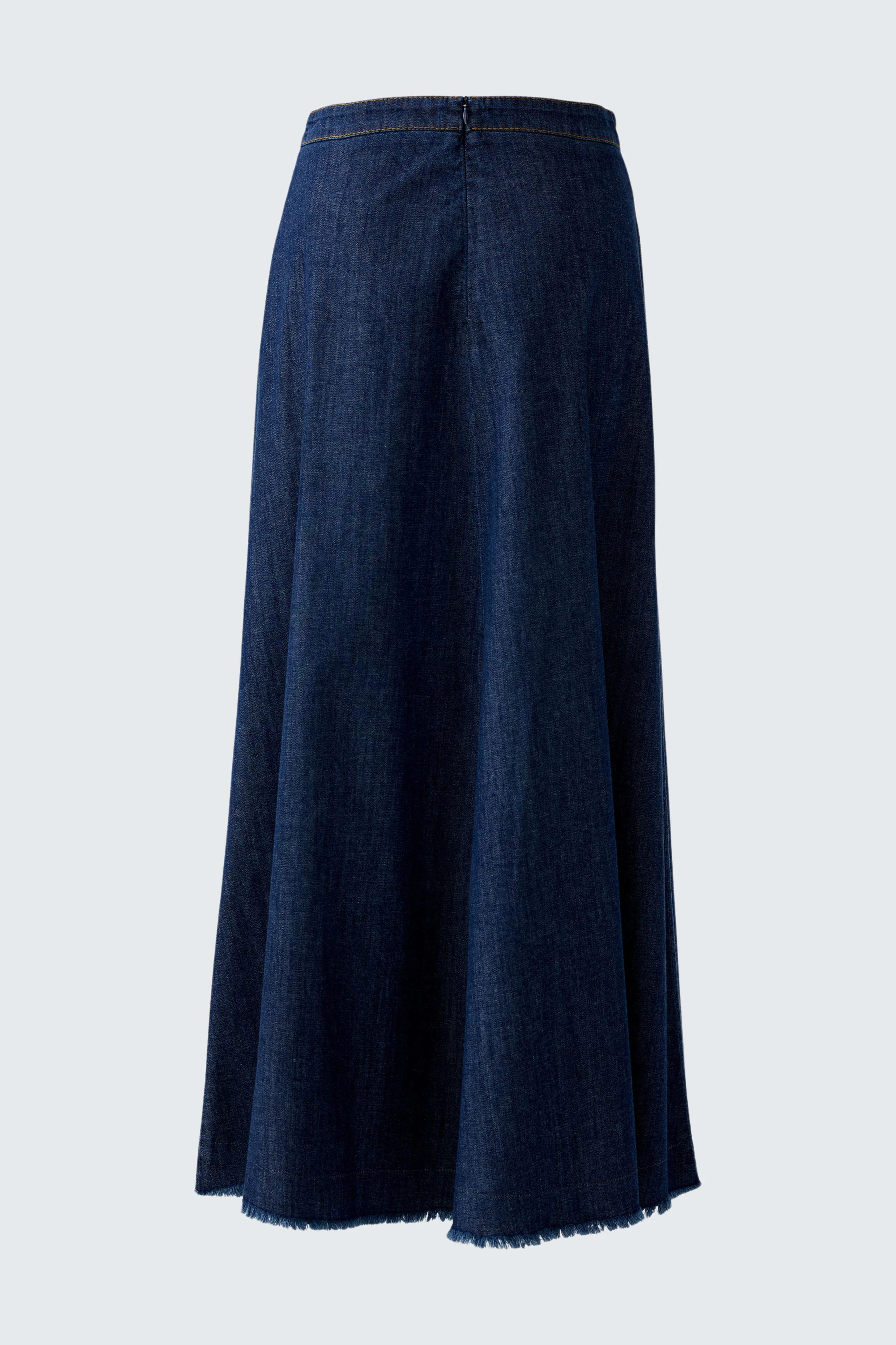 Casual denim skirt: A woman showcases a flowy, dark blue denim skirt, perfect for everyday wear.
