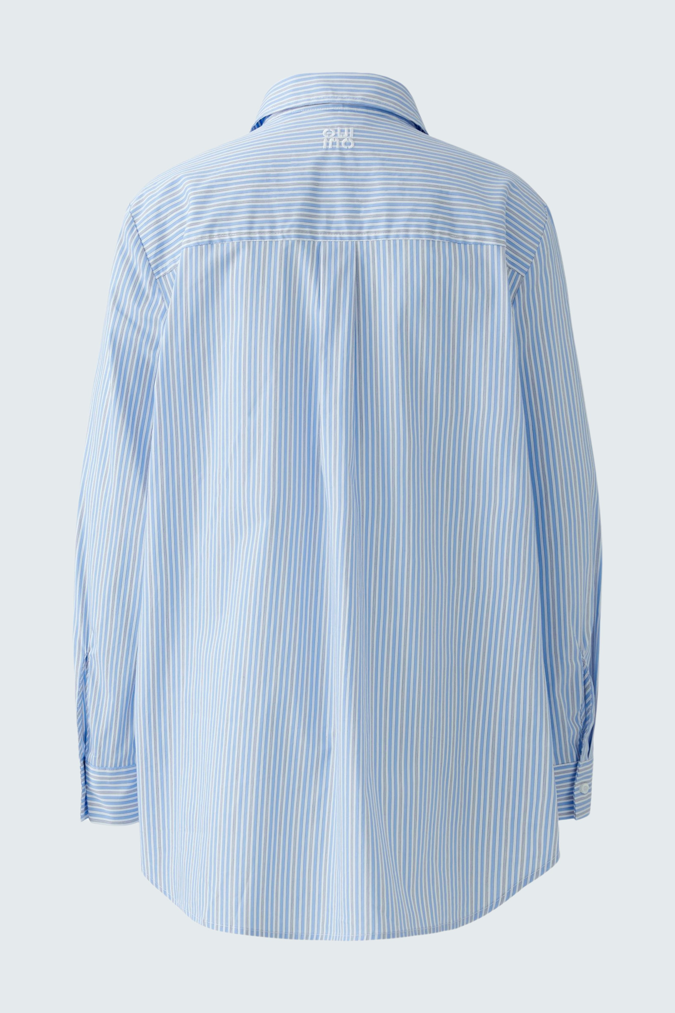 Casual women's blouse: Light blue striped shirt with a relaxed fit and long sleeves, perfect for everyday wear.
