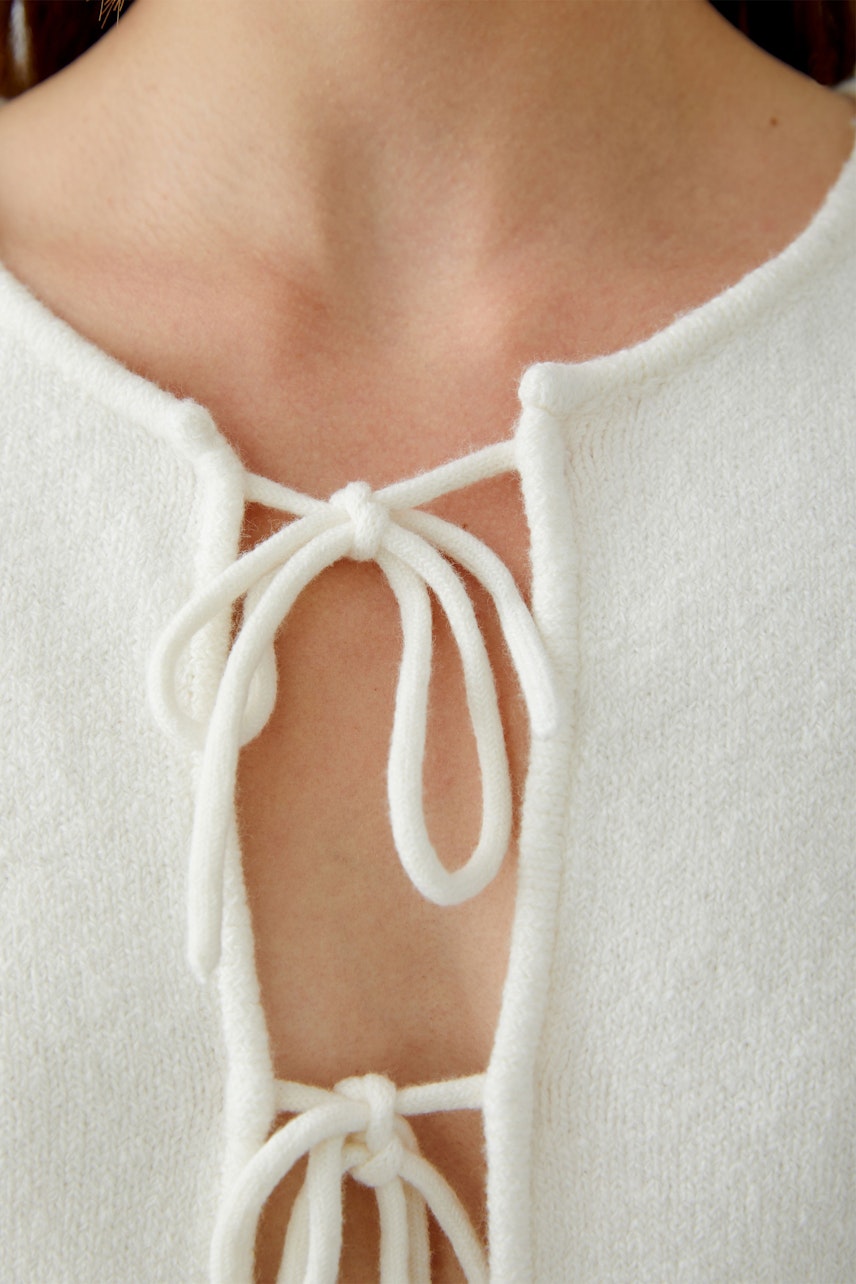 Casual women's cardigan with a soft texture and tie closure, perfect for layering.