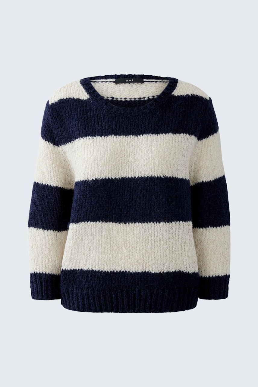 Cozy women's pullover in navy and cream stripes, perfect for casual wear.