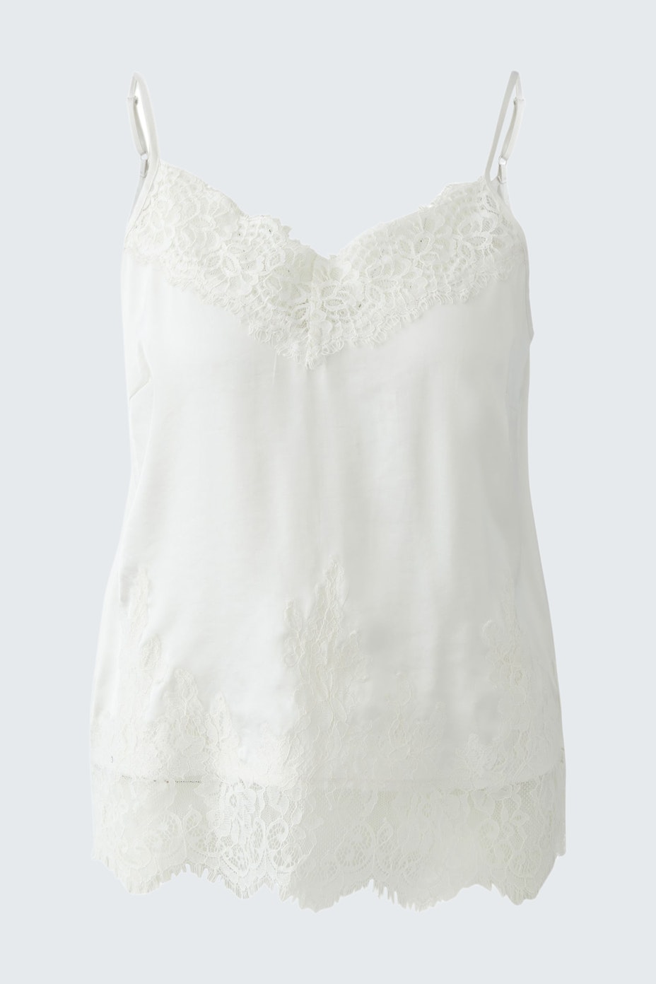 Leichtes Damen-Top in Weiß mit Spitzenverzierungen, ideal für lässige Sommerlooks.