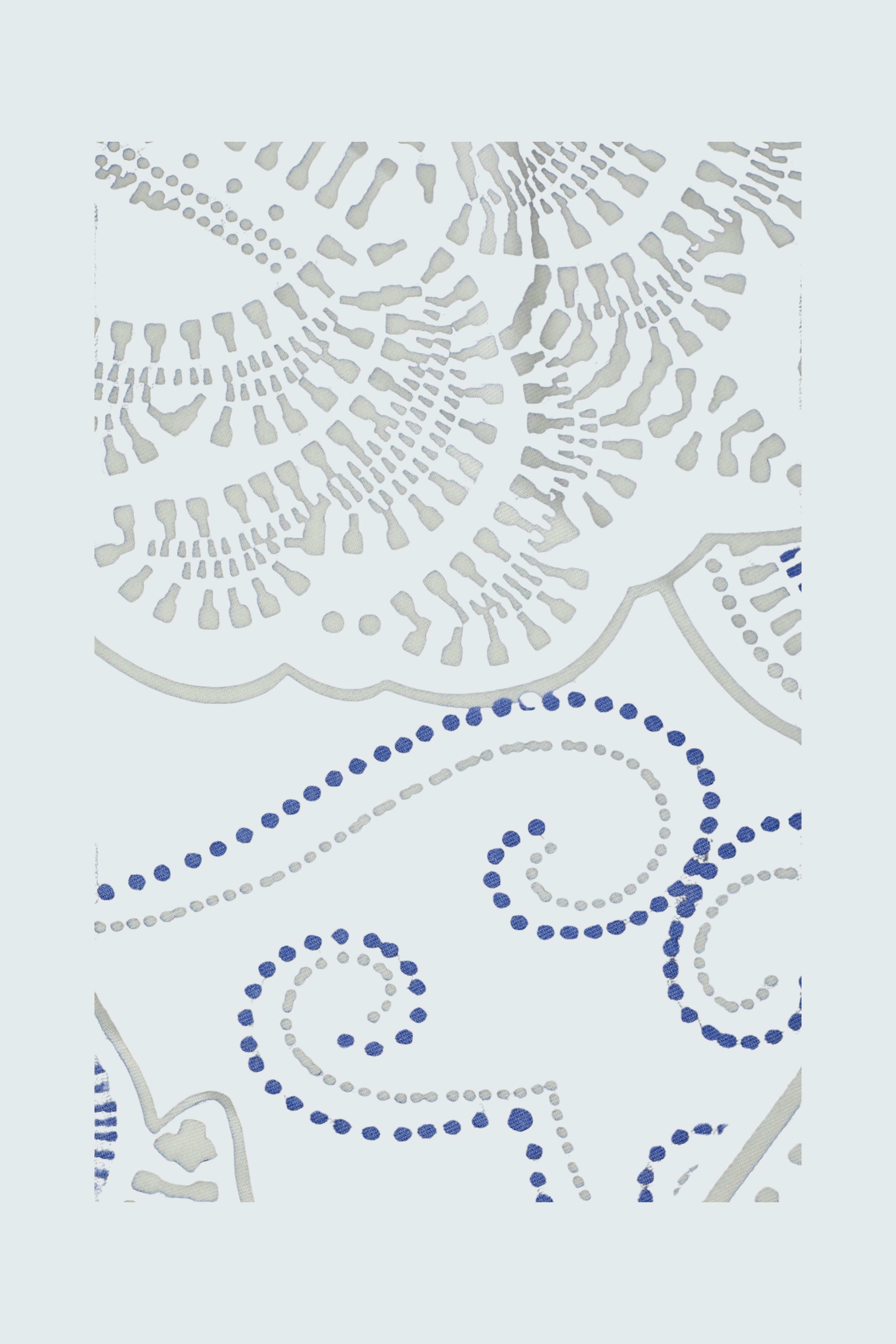 Stylish scarf with intricate patterns in black and white, perfect for adding flair to any outfit.