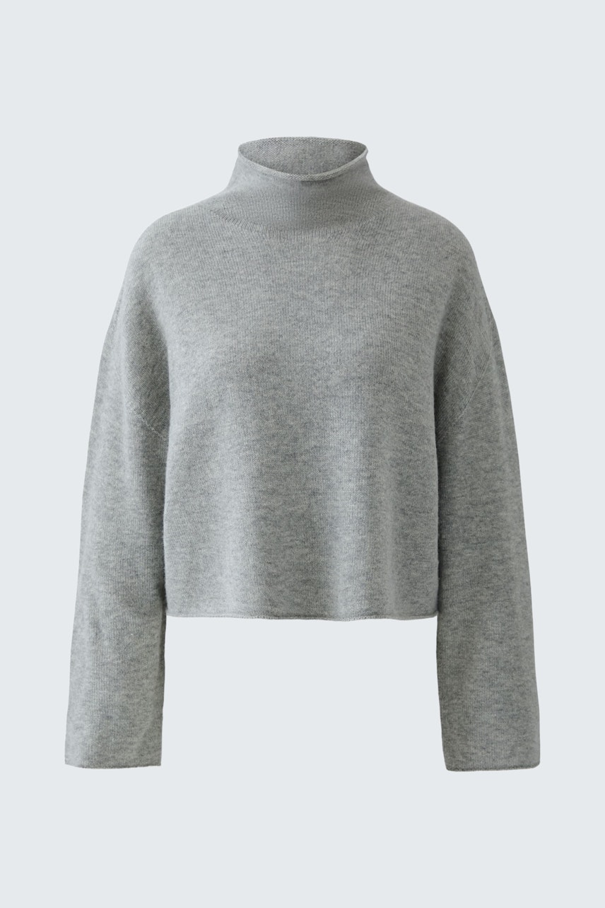 Gemütlicher Damen-Pullover in Grau mit hohem Kragen und lässigem Schnitt.