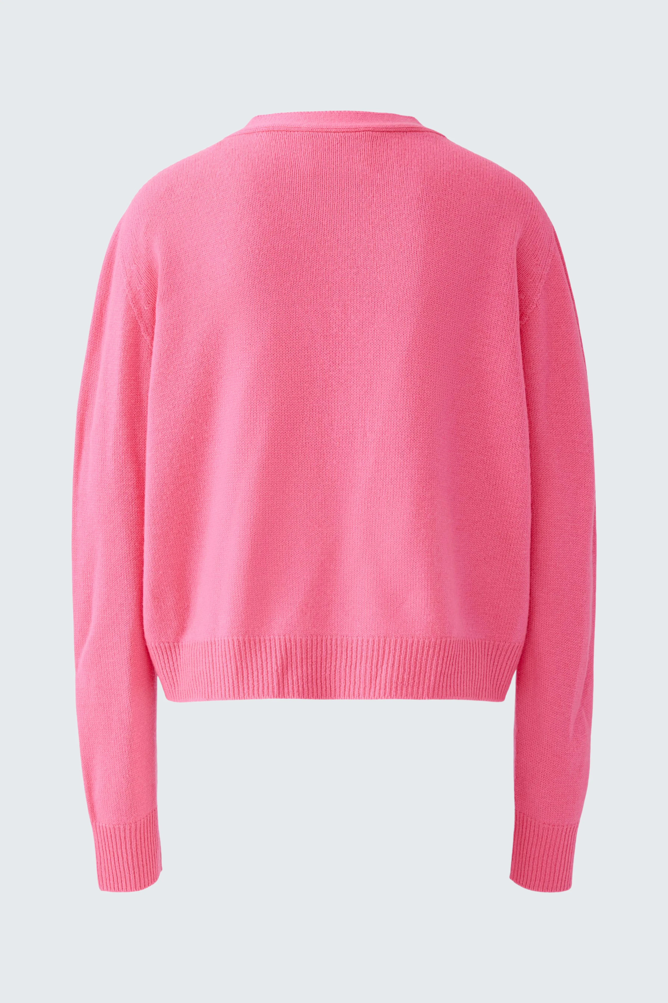 Bequeme Damen-Strickjacke in leuchtendem Pink, ideal für lässige Outfits und entspannte Tage.