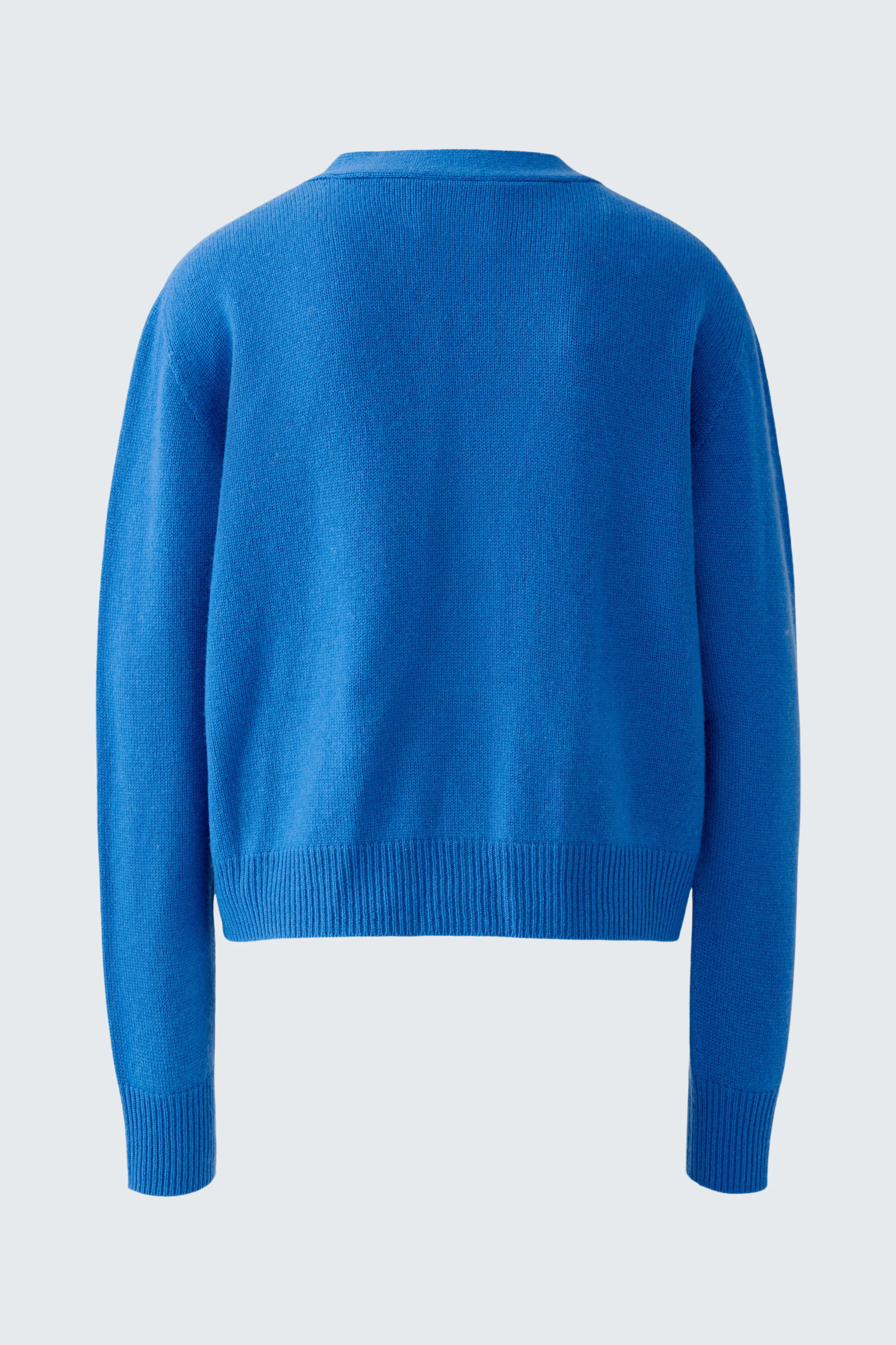 Blaue Damen-Strickjacke: Rückansicht einer lässigen, bequemen Jacke mit langen Ärmeln.