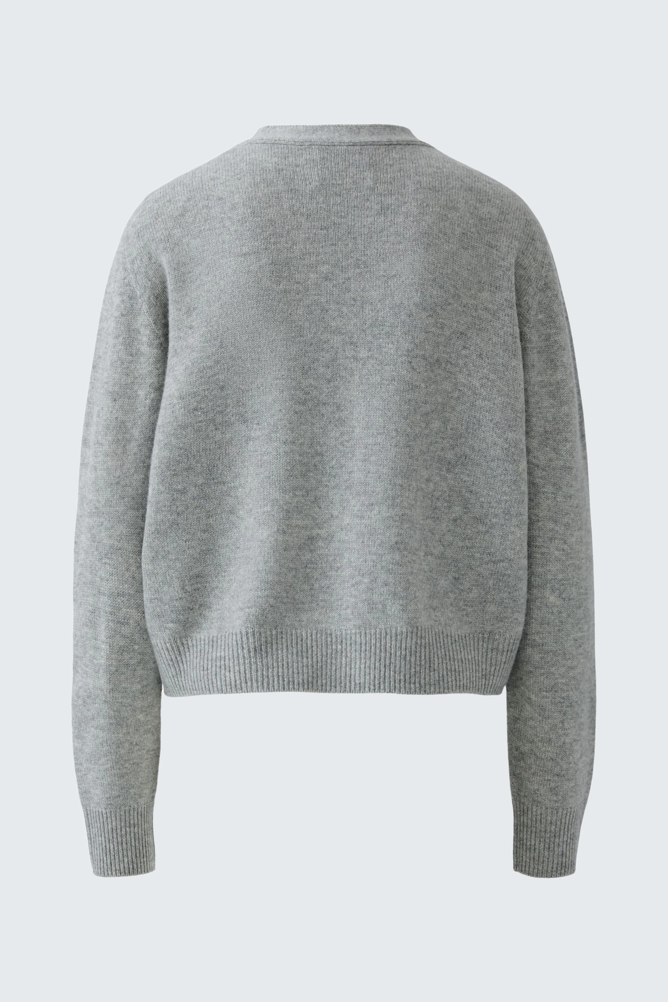 Casual women's cardigan: Back view of a gray knitted cardigan with a relaxed fit.