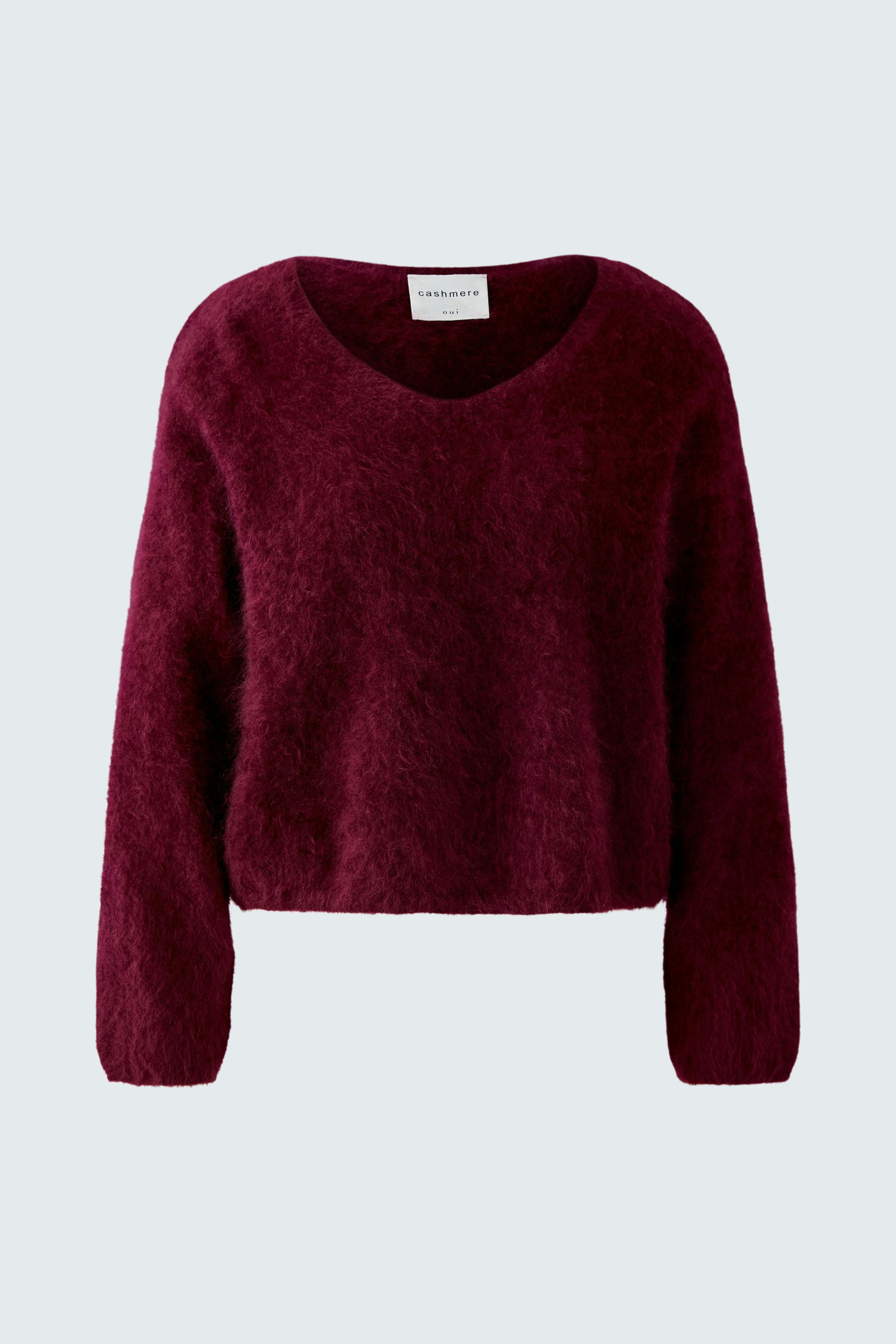 Cozy women's pullover in deep burgundy with a relaxed fit and V-neck design.