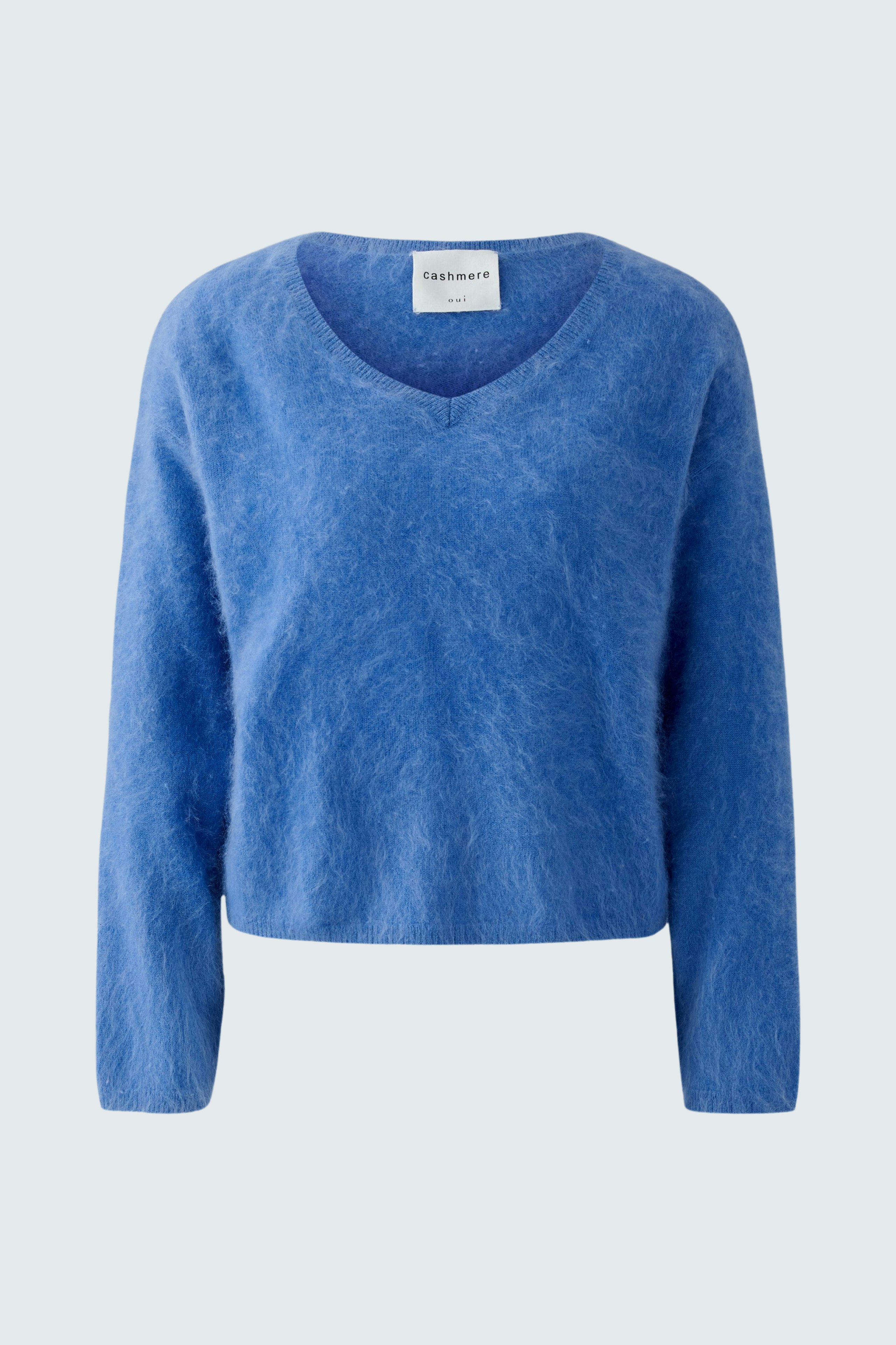 Casual blue pullover with a V-neck, featuring a relaxed fit and soft texture.