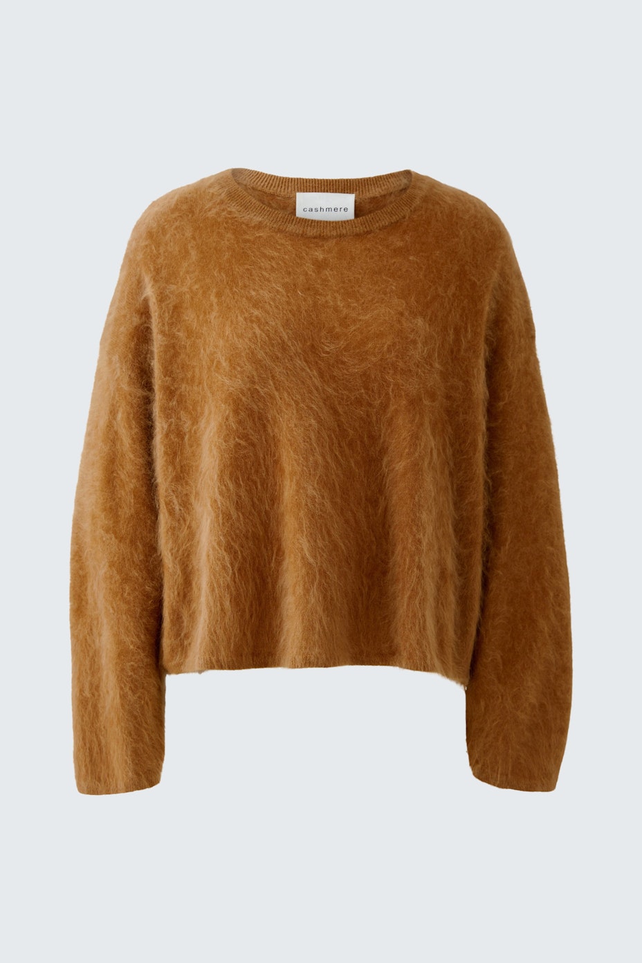 Cozy women's pullover in soft brown, featuring a relaxed fit and fluffy texture.