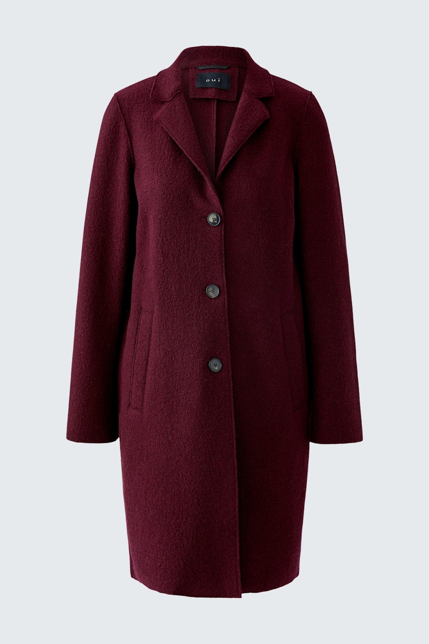 Wollmantel: Roter Damenmantel mit Knöpfen und Taschen, ideal für kühle Tage.