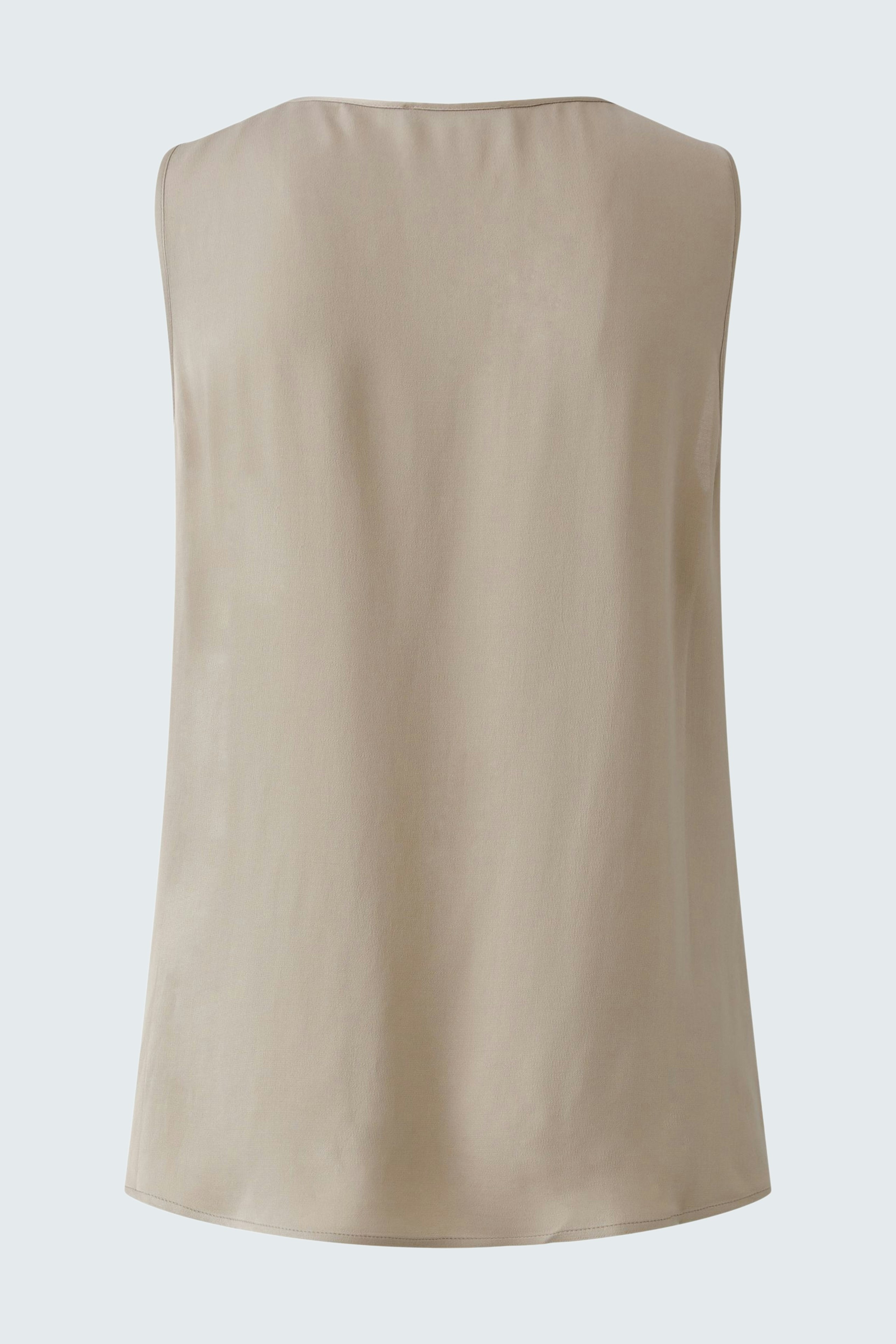 Casual women's top: Beige sleeveless top with a simple design, perfect for everyday wear.