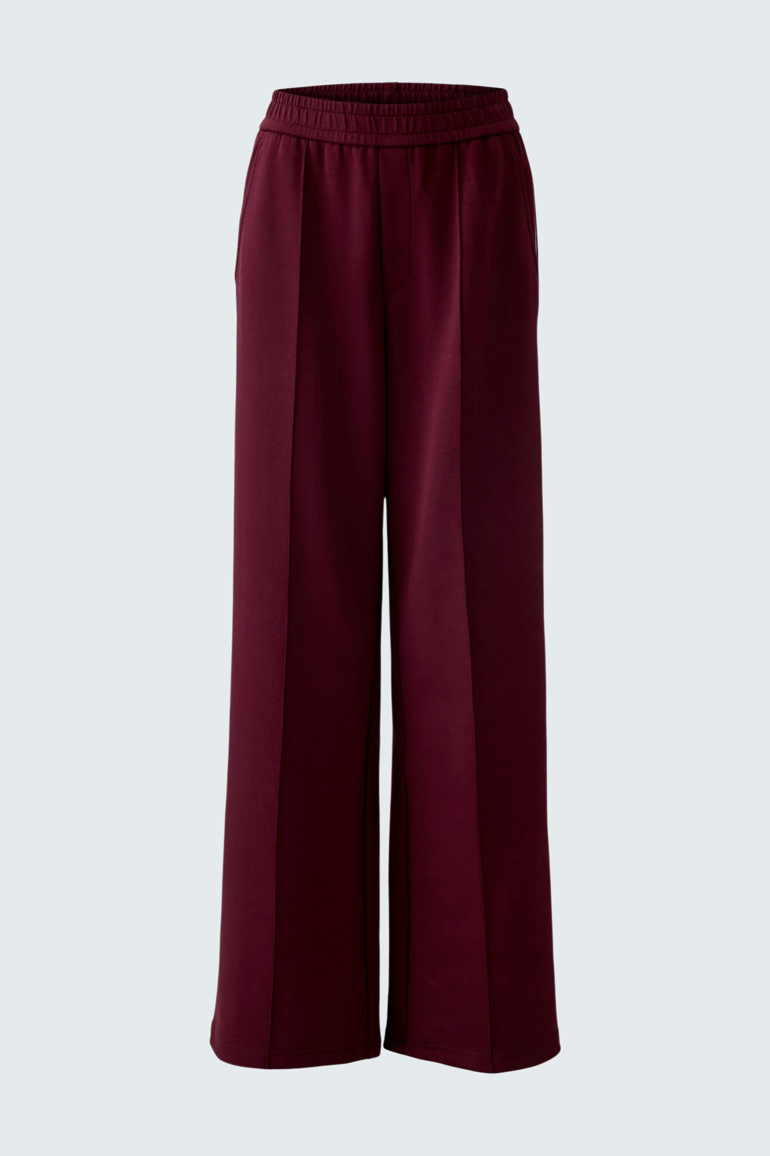 Comfortable women's joggers in deep burgundy with a relaxed fit and elastic waistband.