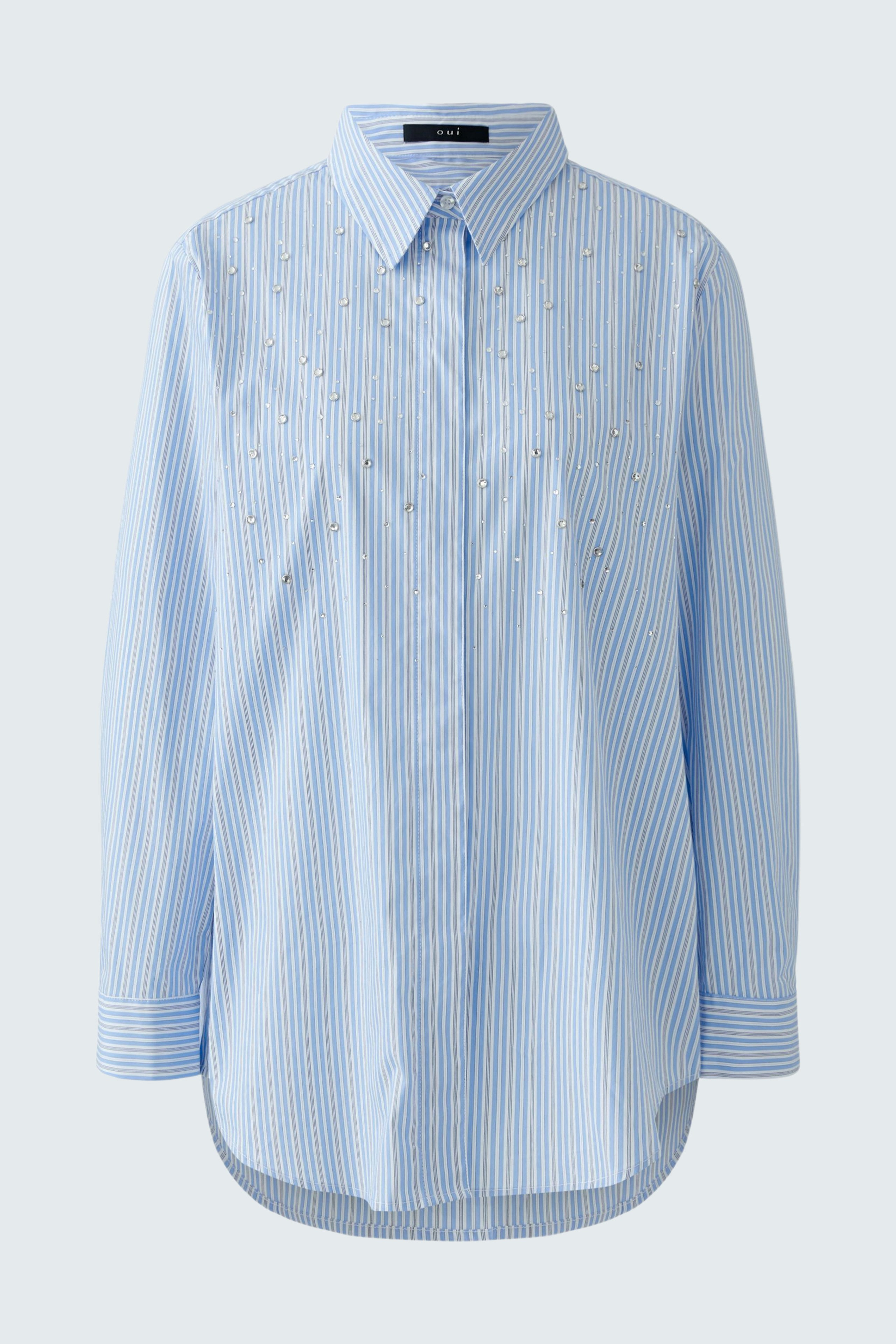 Casual women's blouse: Light blue striped shirt with decorative details, perfect for everyday wear.
