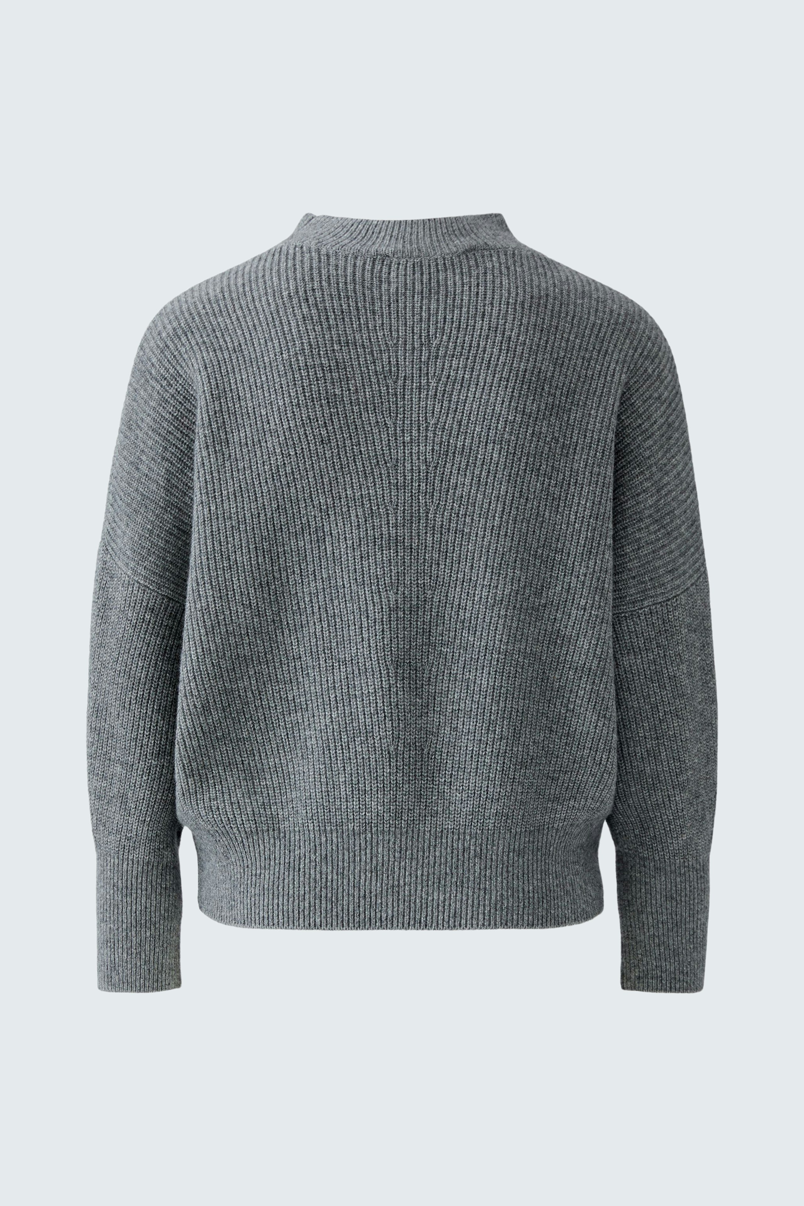 Casual women's pullover: Soft gray knit pullover with a relaxed fit and ribbed texture.
