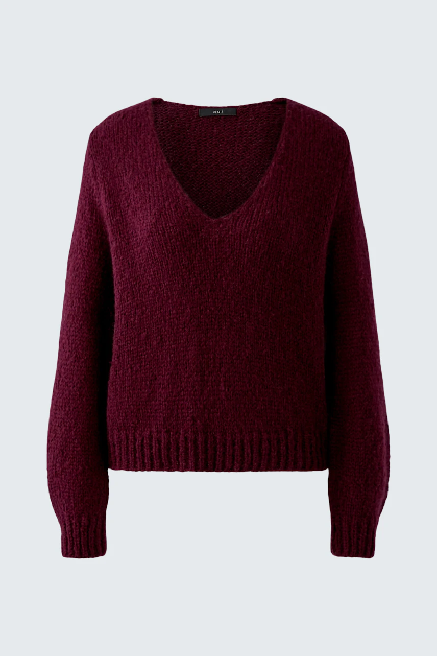 Cozy women's pullover in deep burgundy with a V-neck and relaxed fit.