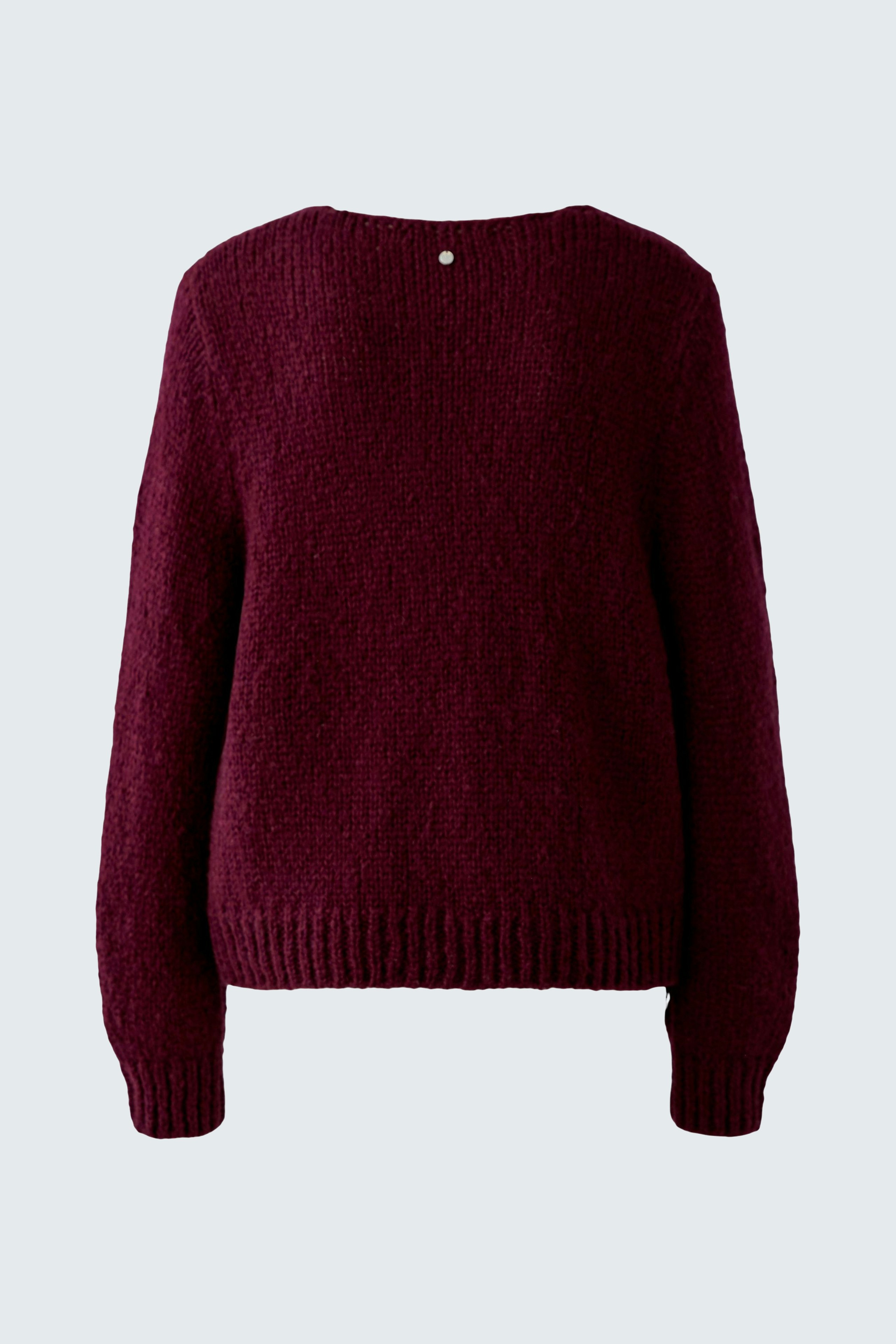 Cozy women's pullover in deep burgundy with a relaxed fit and ribbed hem.