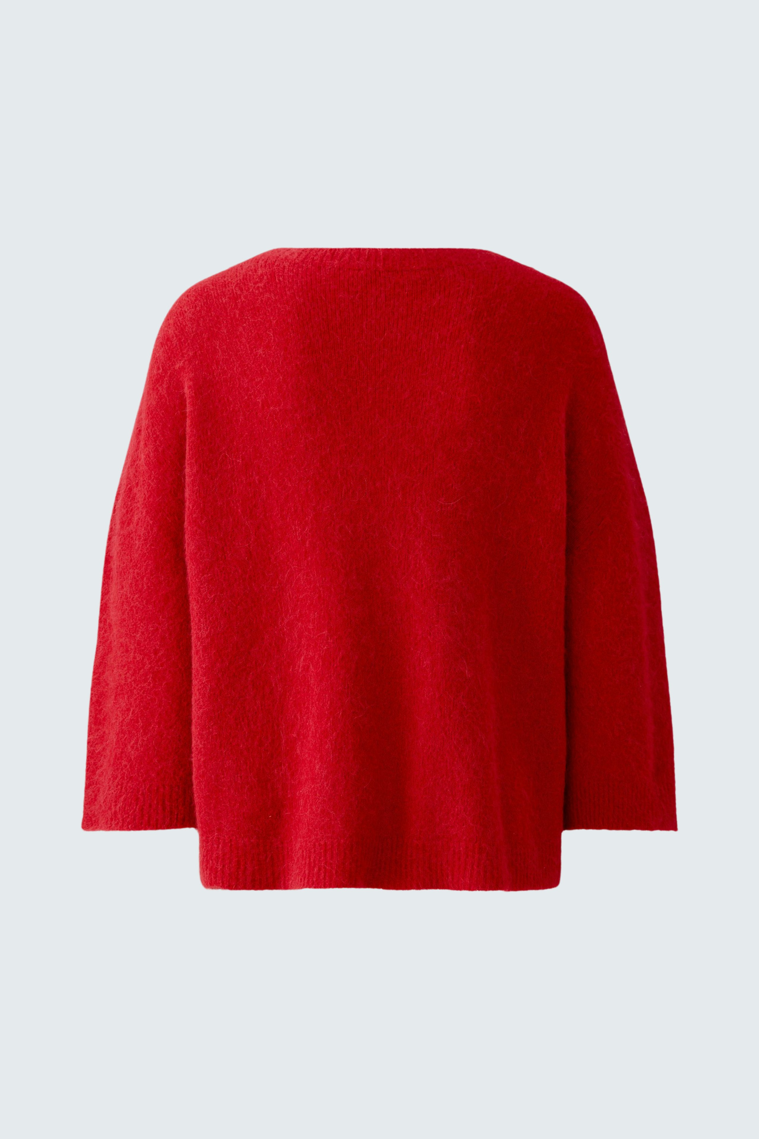 Cozy red pullover: A soft, relaxed fit pullover for women, perfect for casual wear.