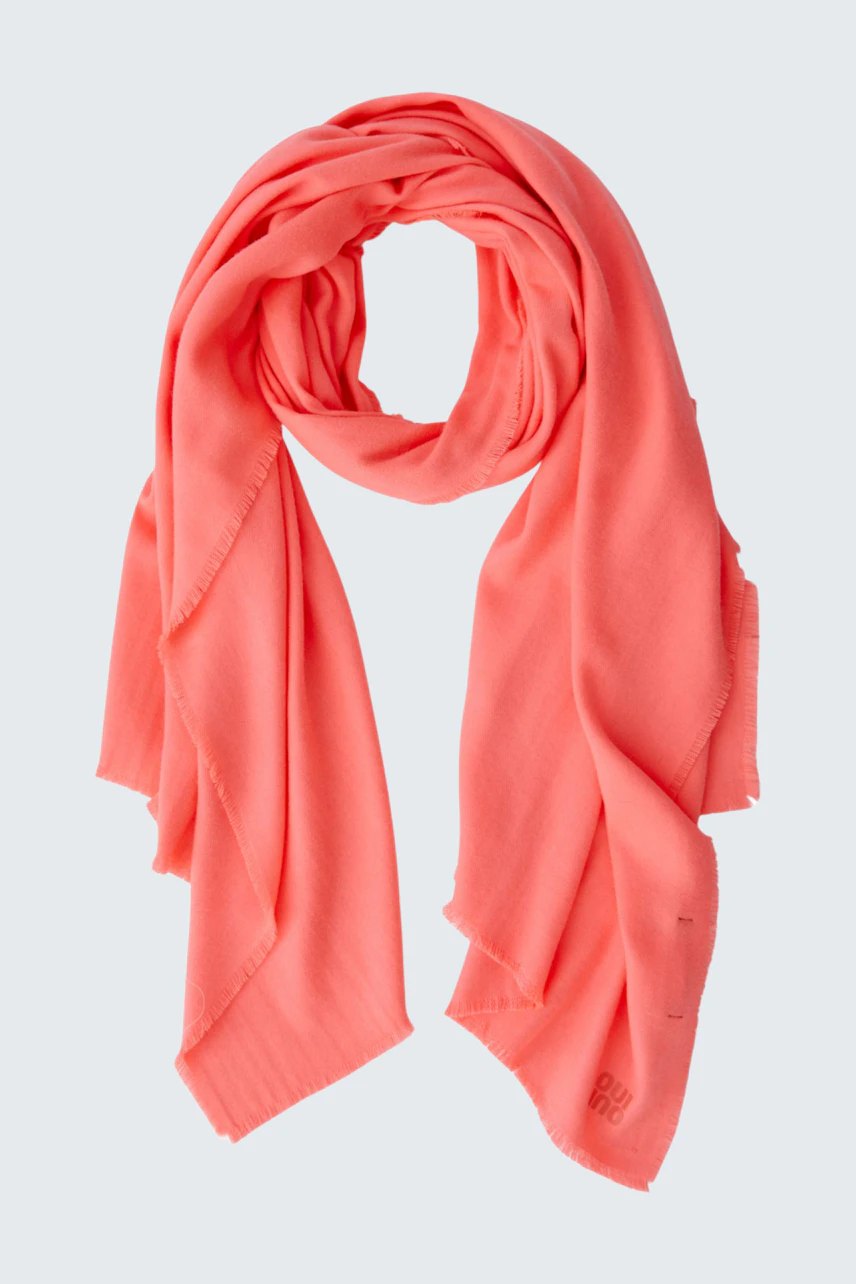 Lightweight women's scarf in coral, perfect for layering and adding a pop of color.