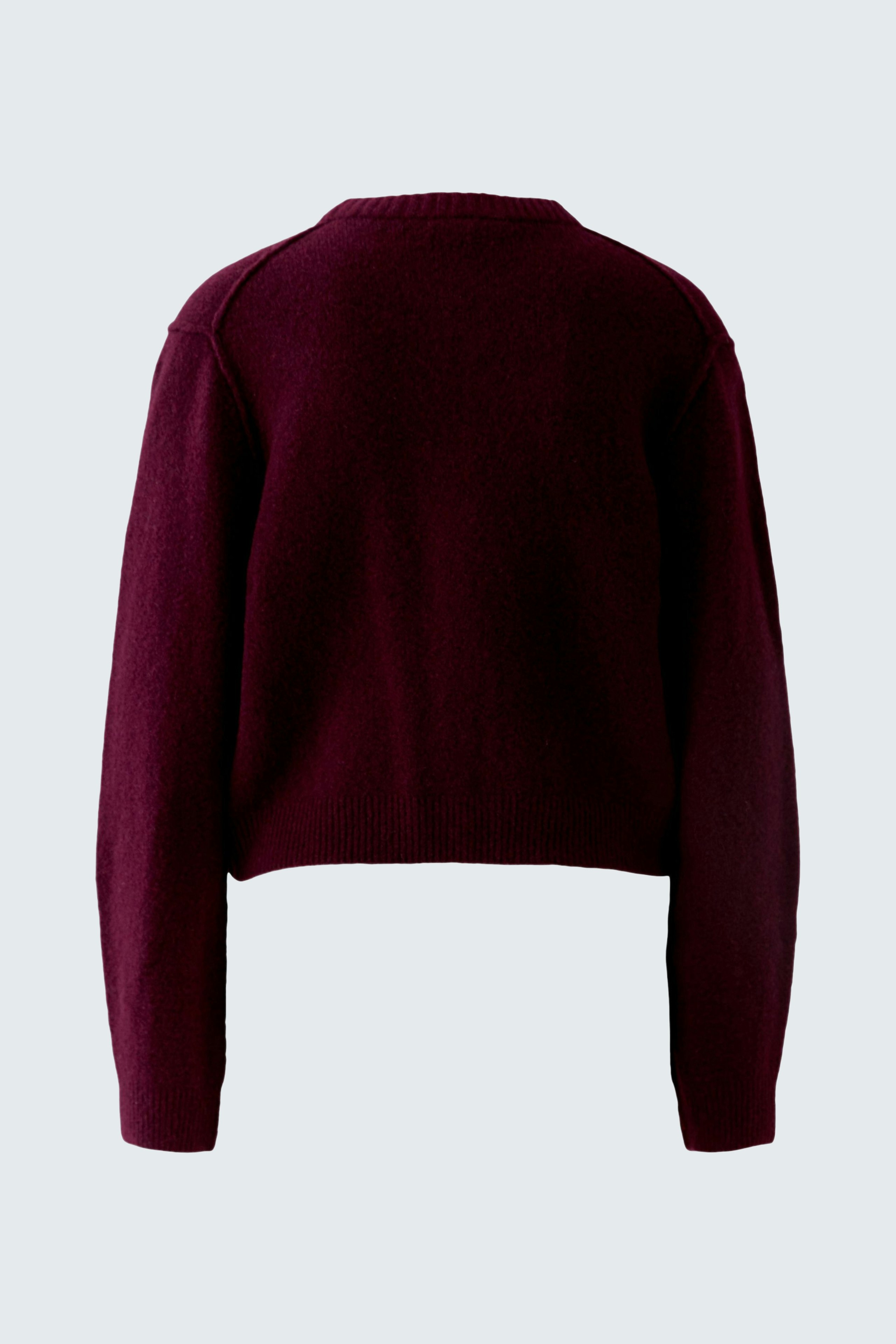 Casual women's cardigan: Back view of a burgundy pullover with a relaxed fit and simple design.