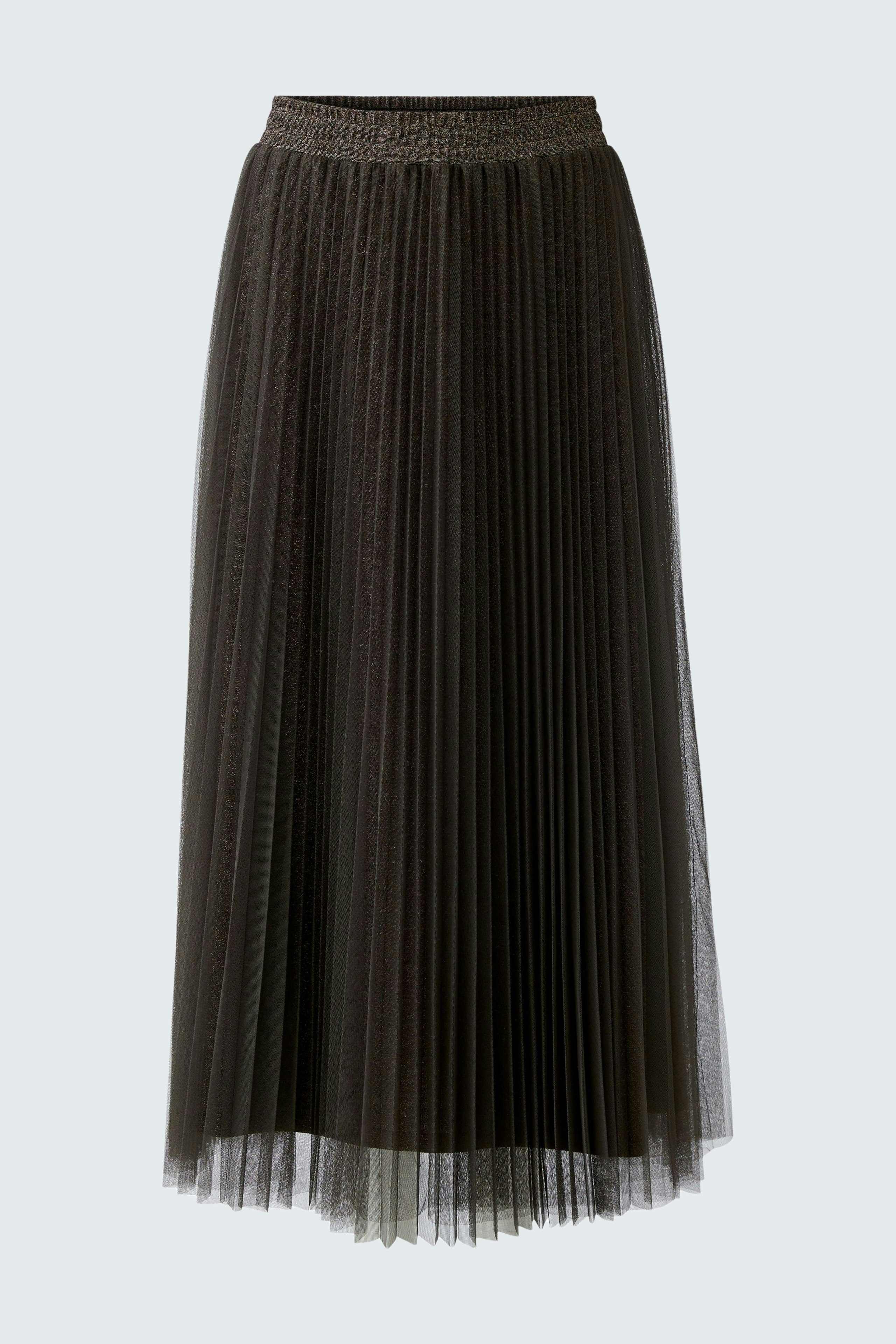 Pleated skirt: A woman in a dark pleated skirt with a comfortable waistband, perfect for casual wear.