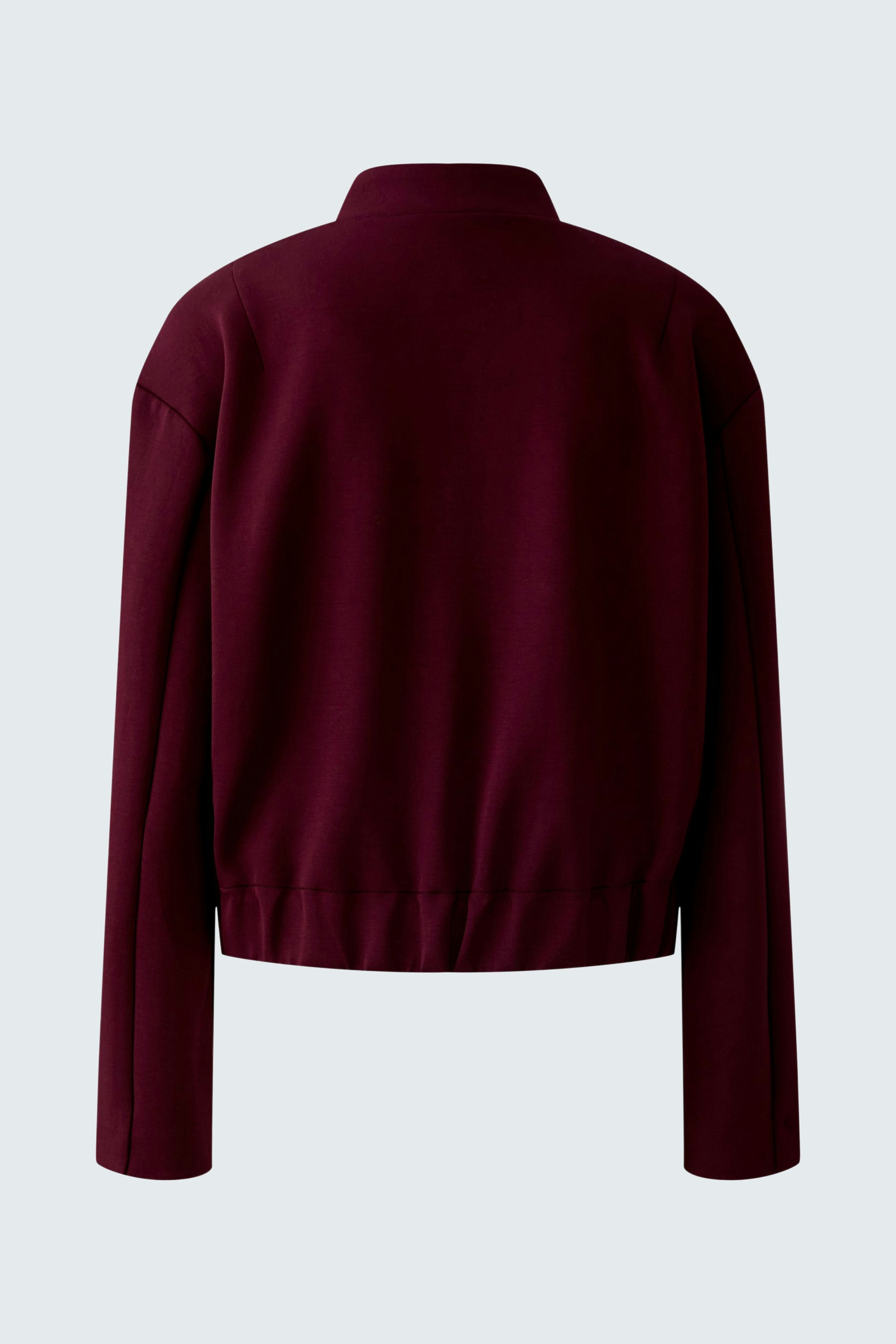 Casual women's blouson: Back view of a burgundy cropped jacket with long sleeves.