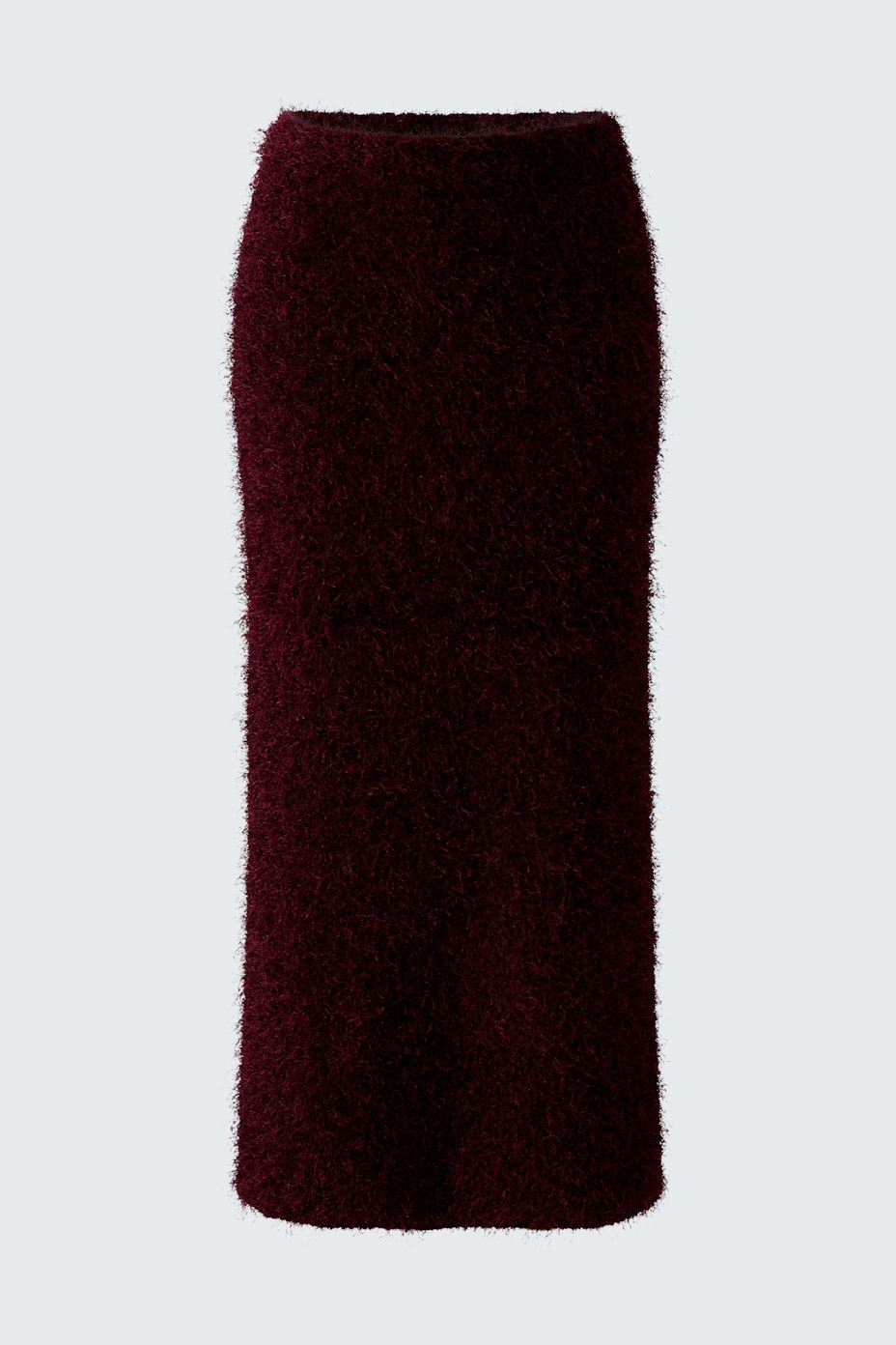 Cozy women's knitted skirt in deep burgundy, perfect for casual layering.