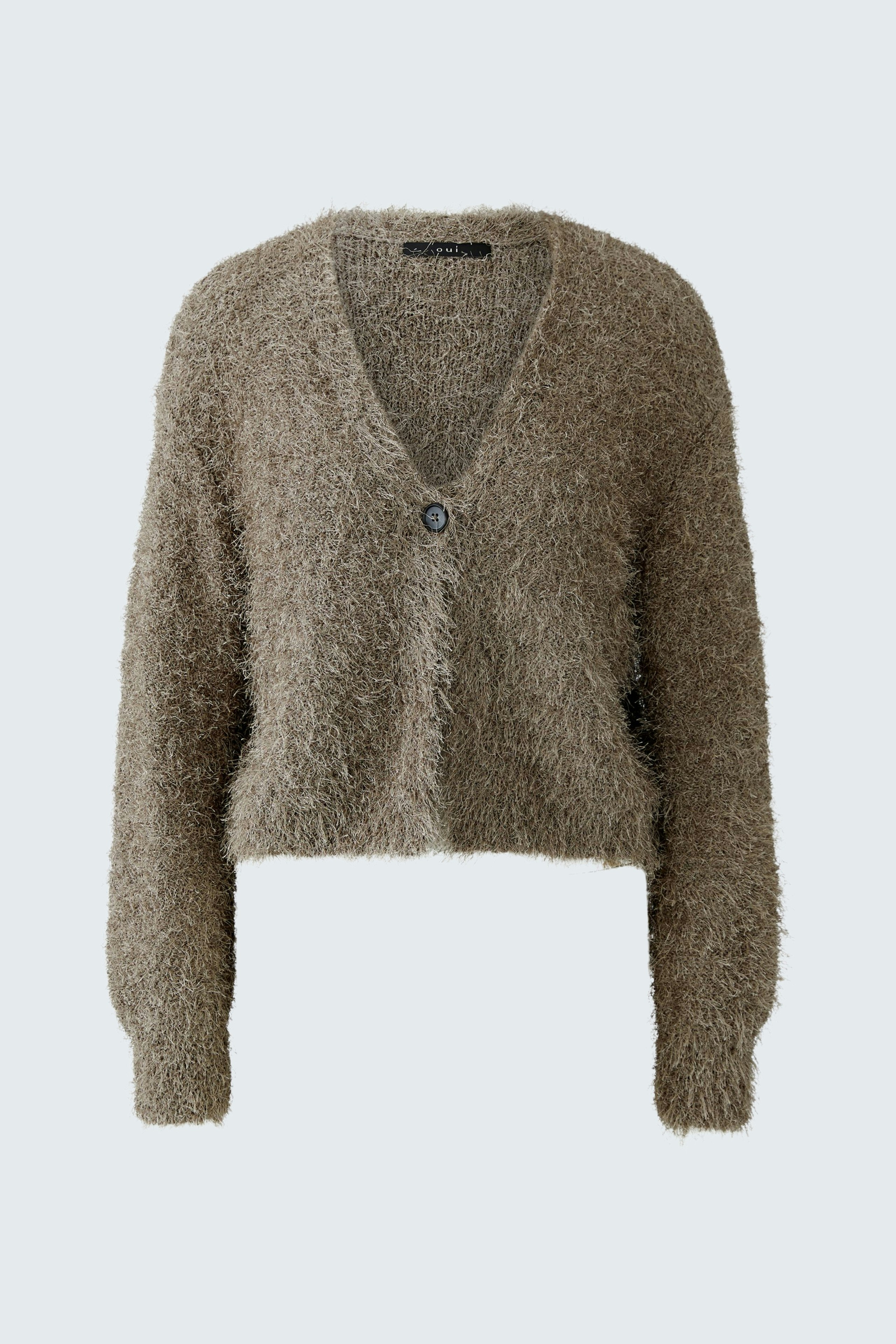 Cozy women's cardigan in soft, fluffy fabric with a button closure and cropped fit.