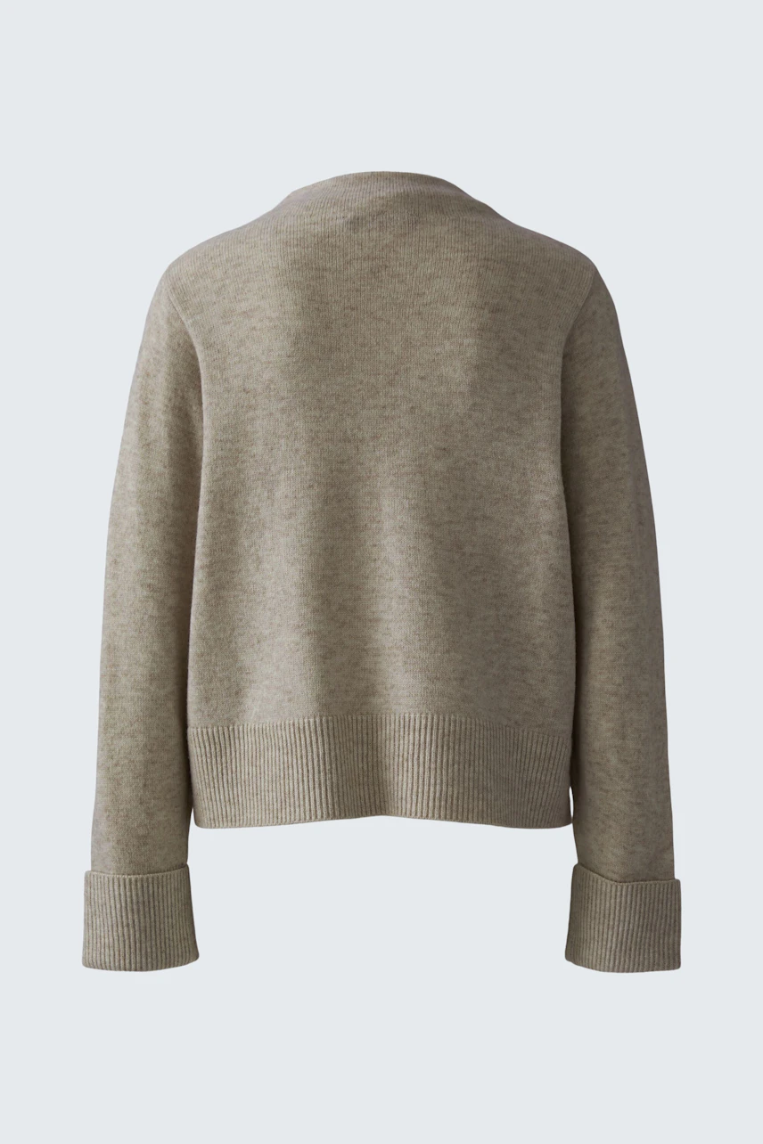 Casual women's pullover: Back view of a soft, light brown pullover with a relaxed fit and ribbed cuffs.
