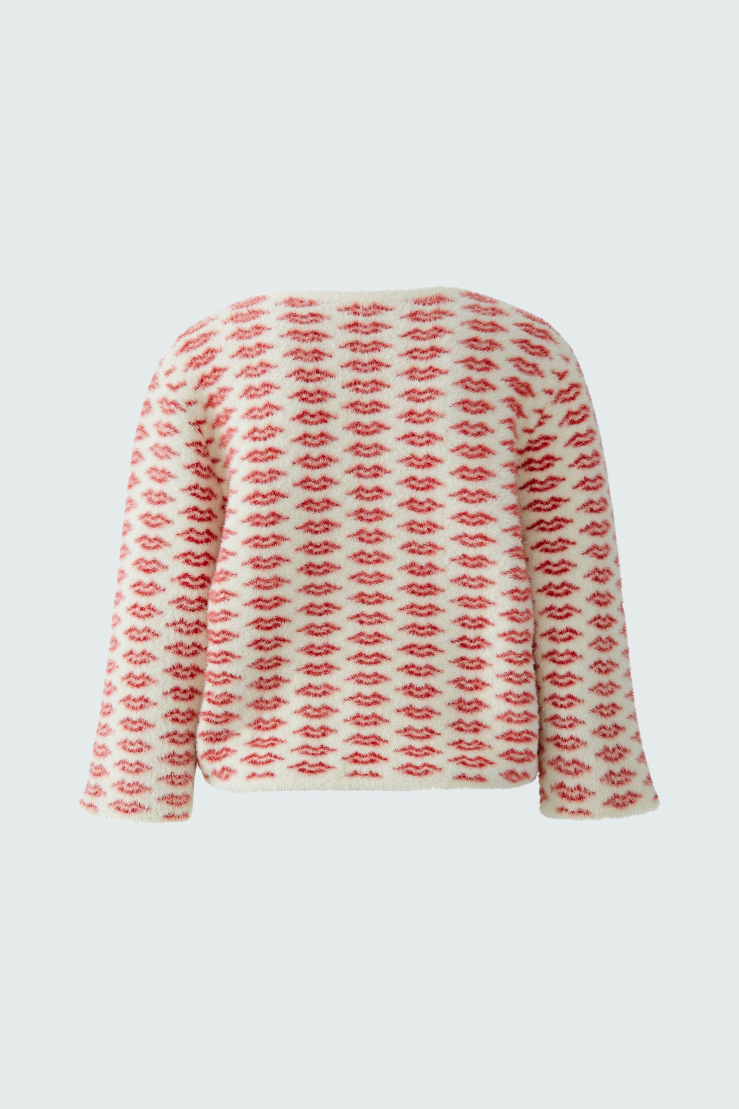 Casual women's pullover: A relaxed fit pullover with a playful red lip pattern on a light background.