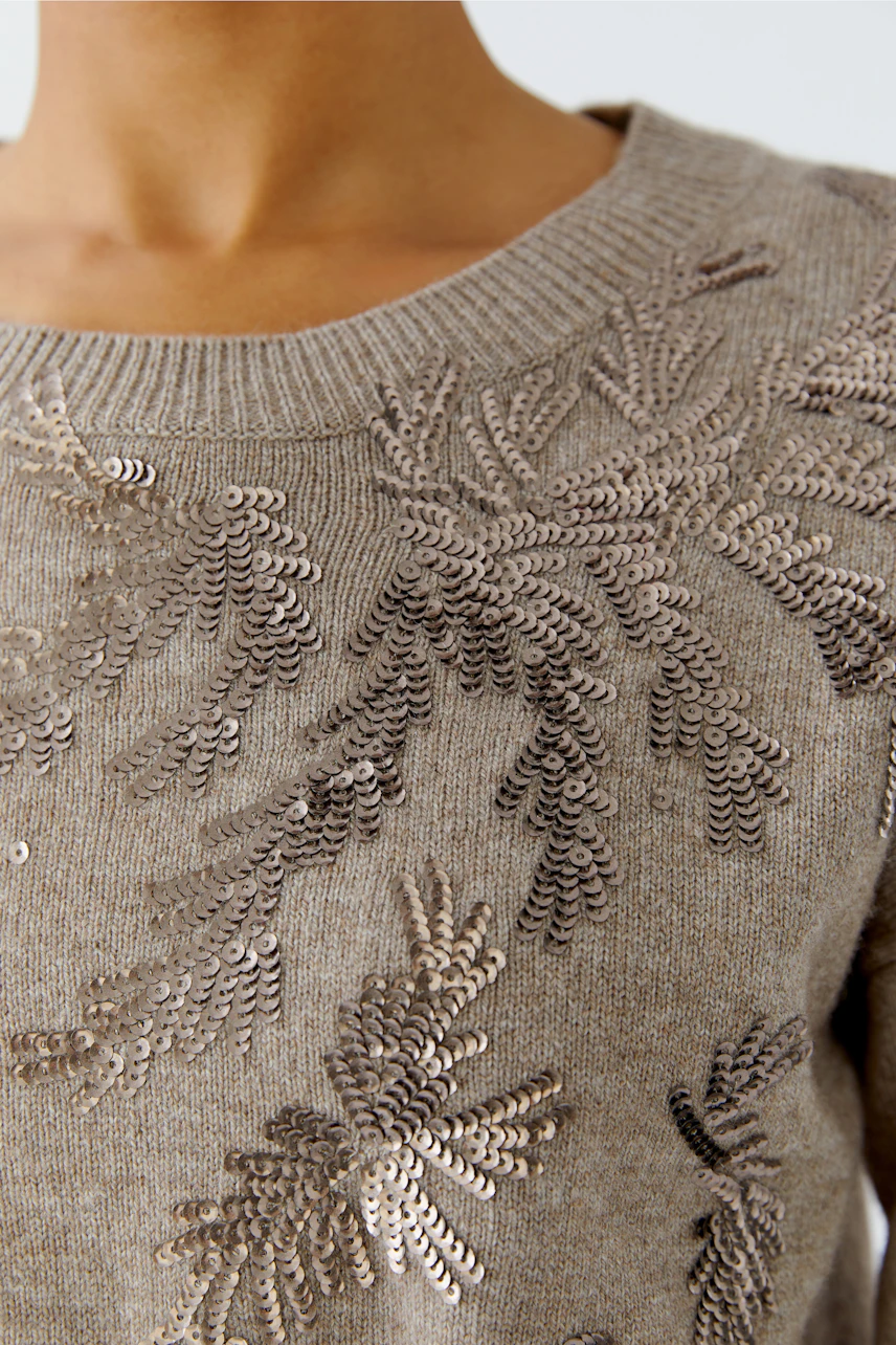 Damen-Pullover in Beige mit glitzernden Details, lässig und bequem, ideal für den Alltag.