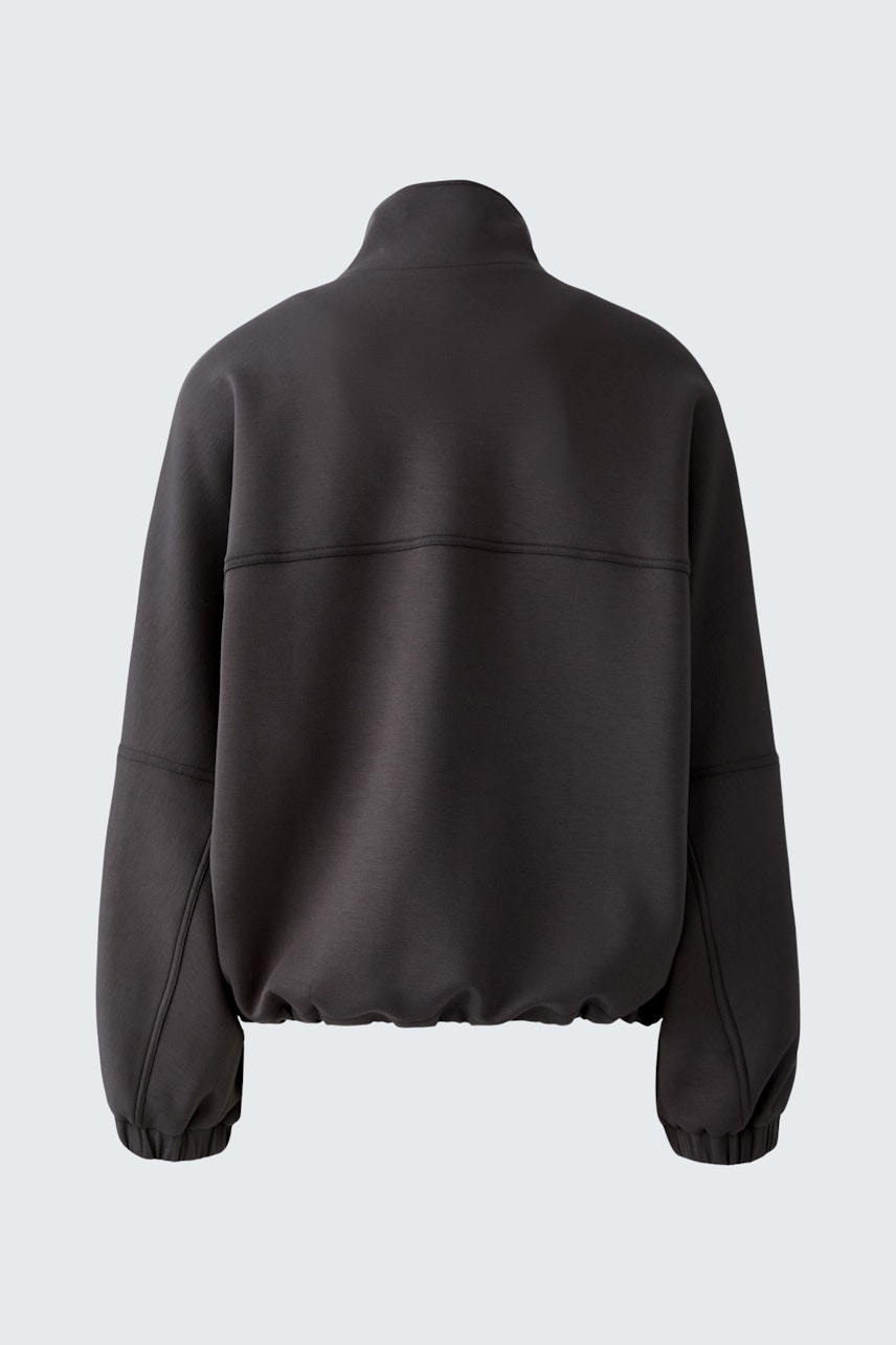 Damen-Jacke: Rückansicht einer lässigen, schwarzen Jacke mit hohem Kragen und elastischen Bündchen.