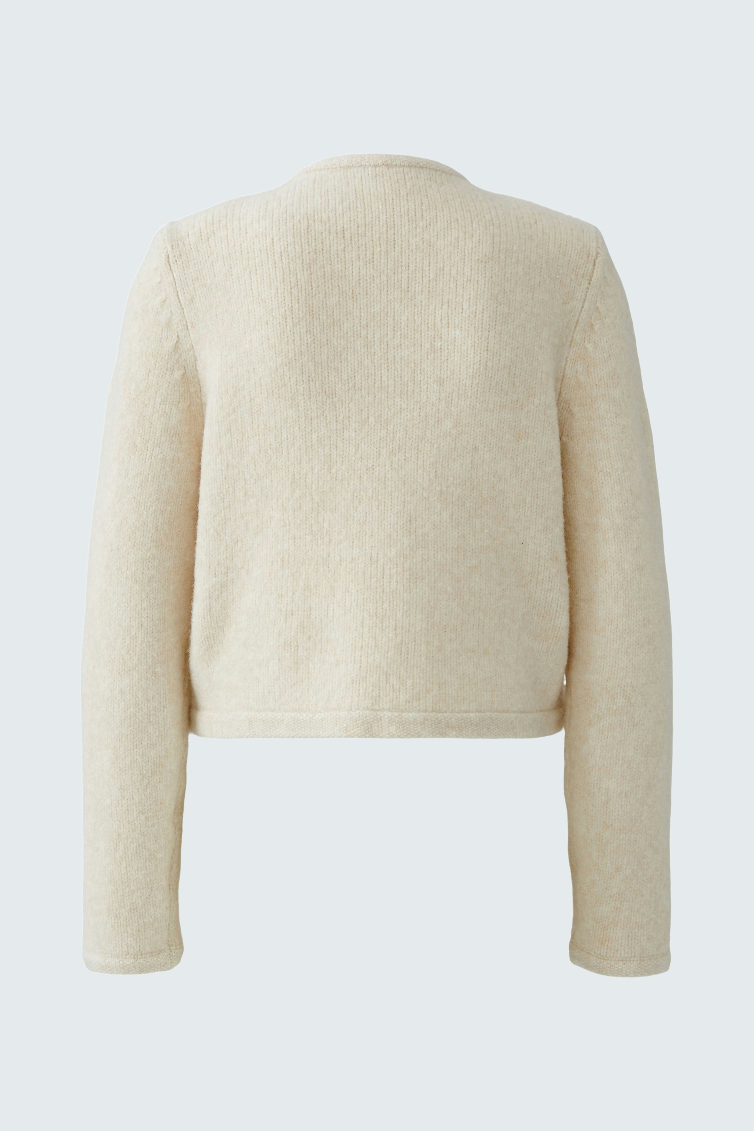 Casual women's cardigan in soft beige, featuring a relaxed fit and long sleeves.