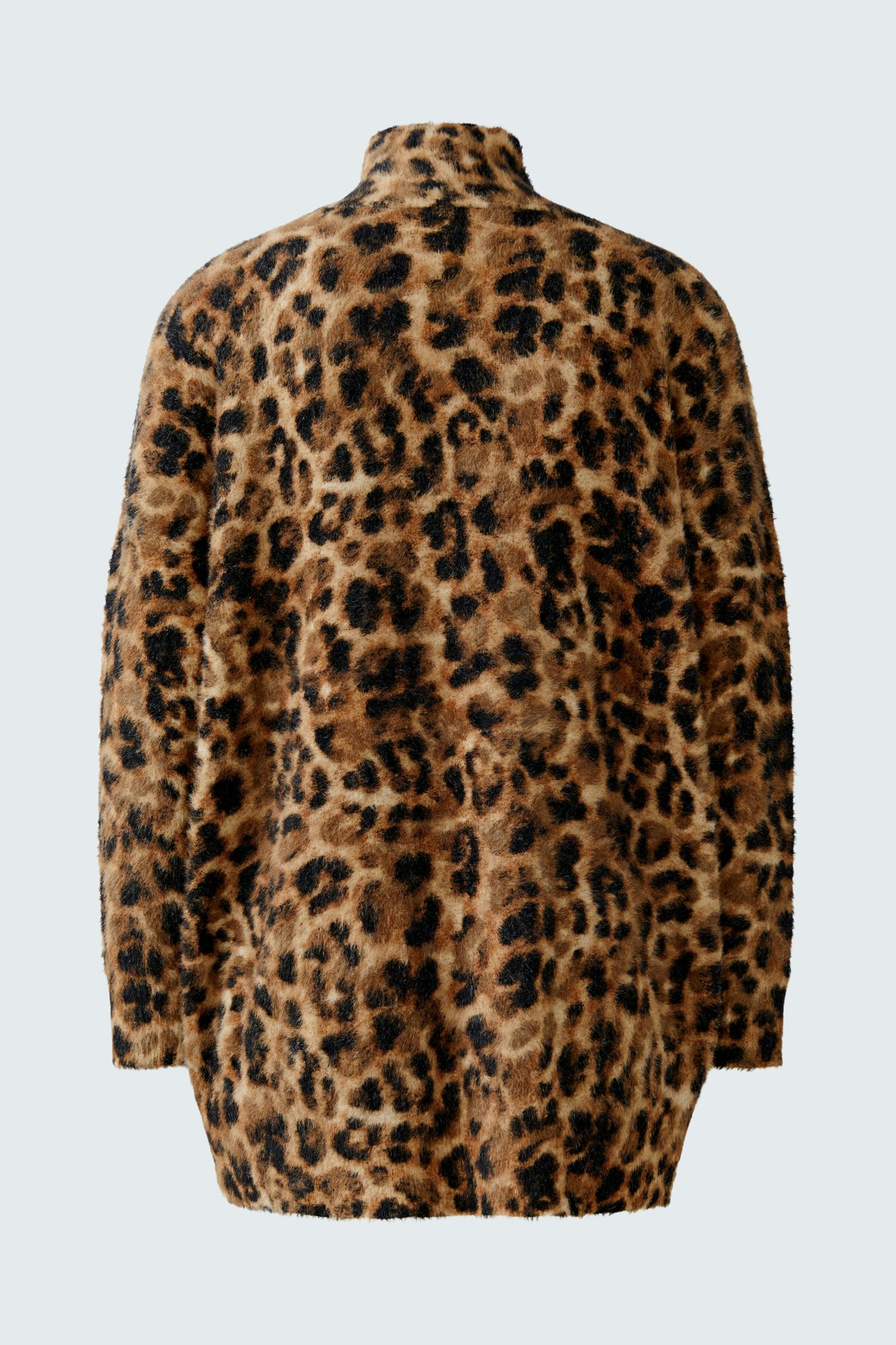Cozy women's pullover in a bold leopard print, featuring a relaxed fit and soft texture.