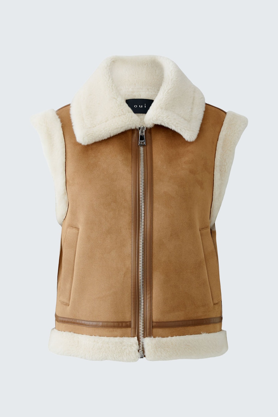 Beige Damen-Weste mit Stehkragen und Reißverschluss, ideal für lässige Outfits.