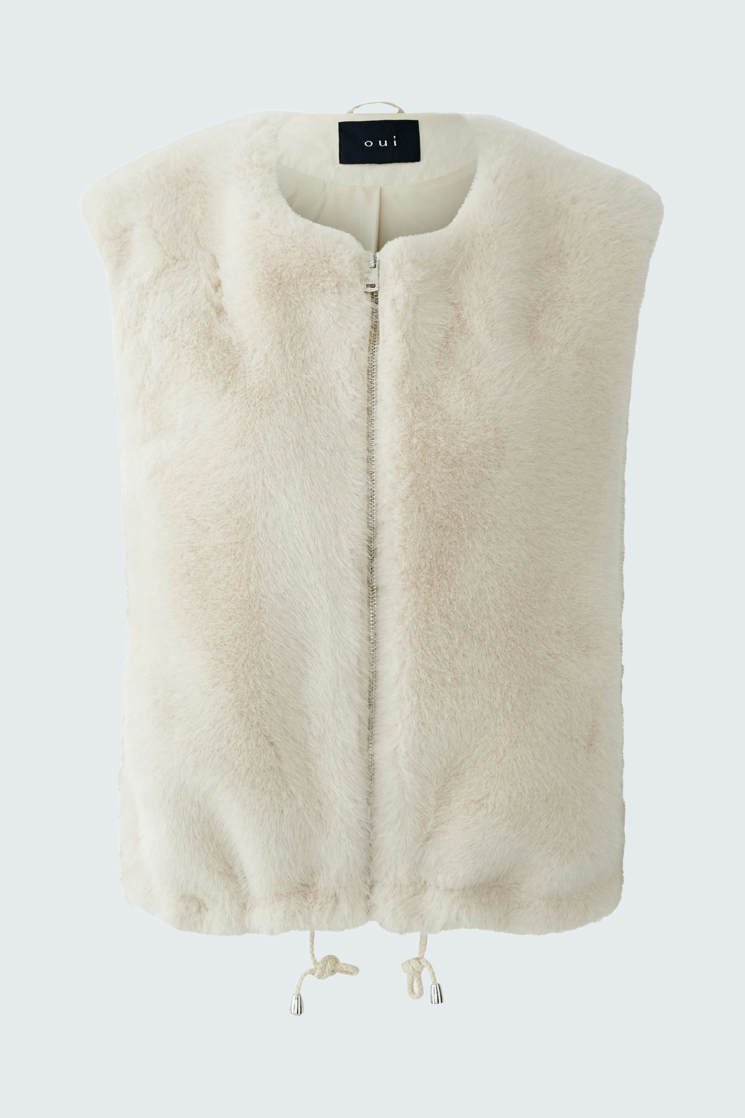 Cozy women's vest in soft cream color with a zip closure and adjustable drawstring.