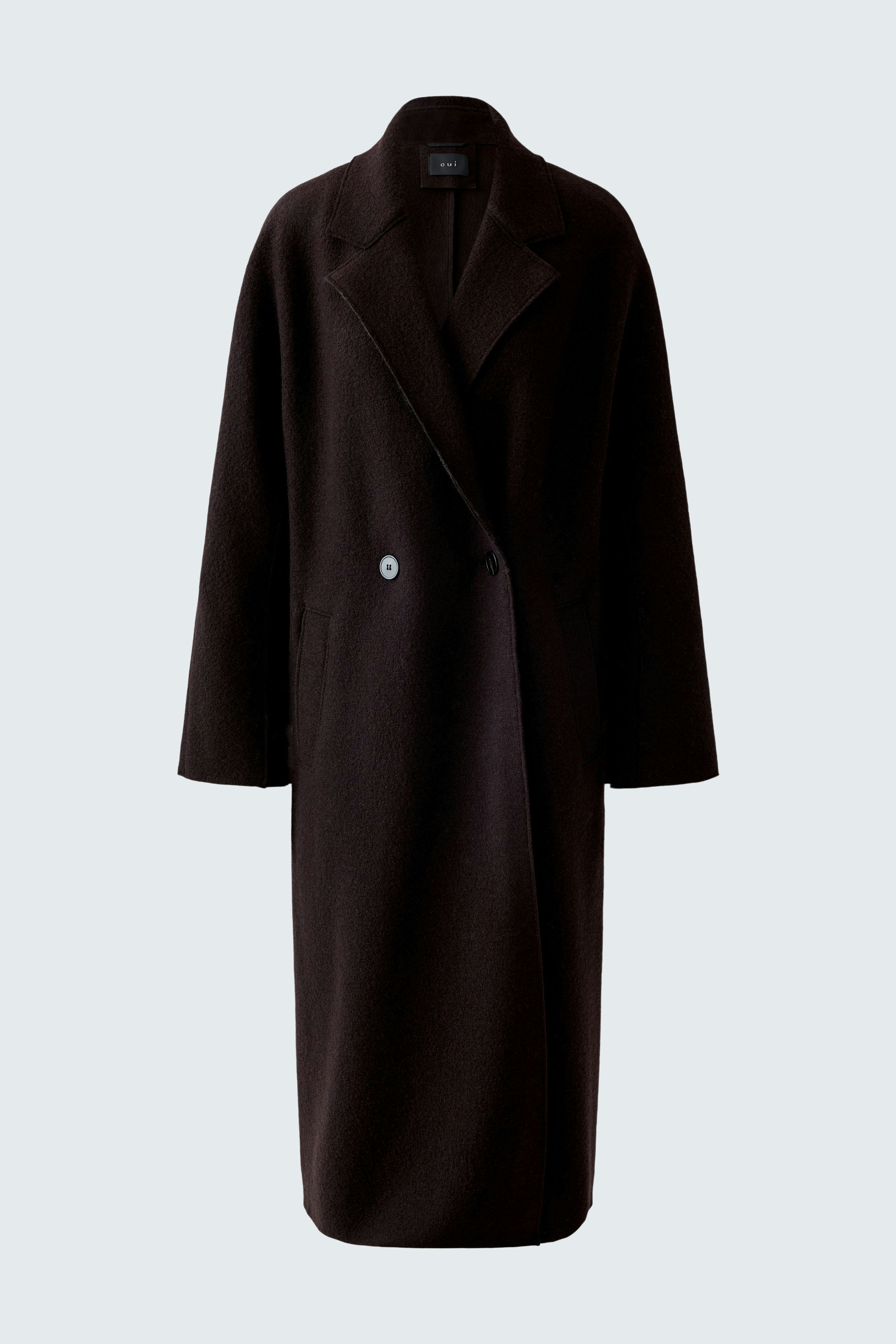 Stylish women's winter coat in dark brown, featuring a relaxed fit and double-breasted design.