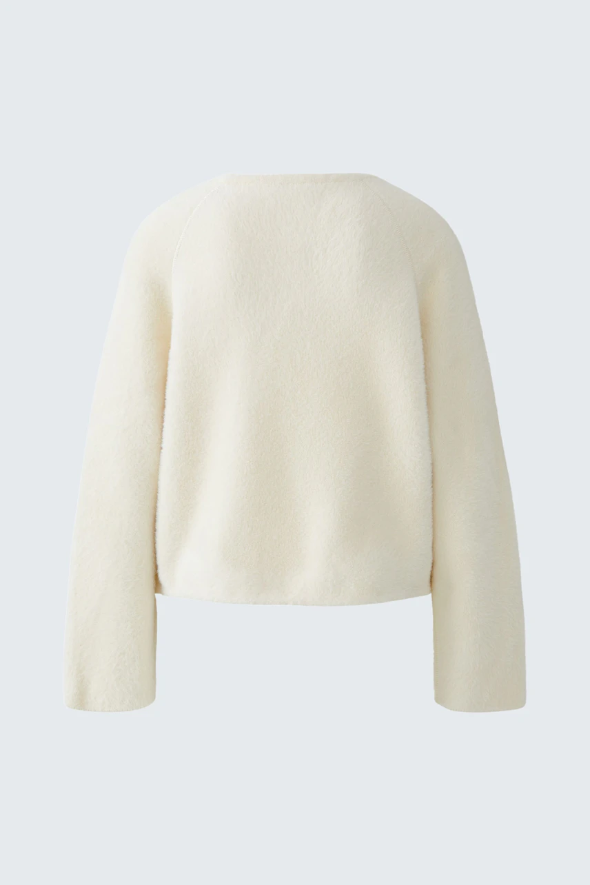 Bequemer Damen-Pullover in Cremefarbe mit lässigem Schnitt und langen Ärmeln.