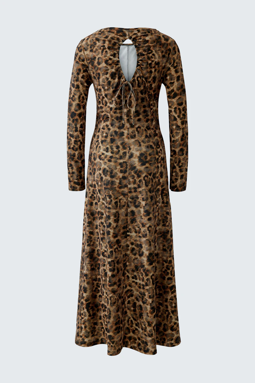 Leopard print dress: A long-sleeve dress with a back tie detail, showcasing a bold animal pattern.