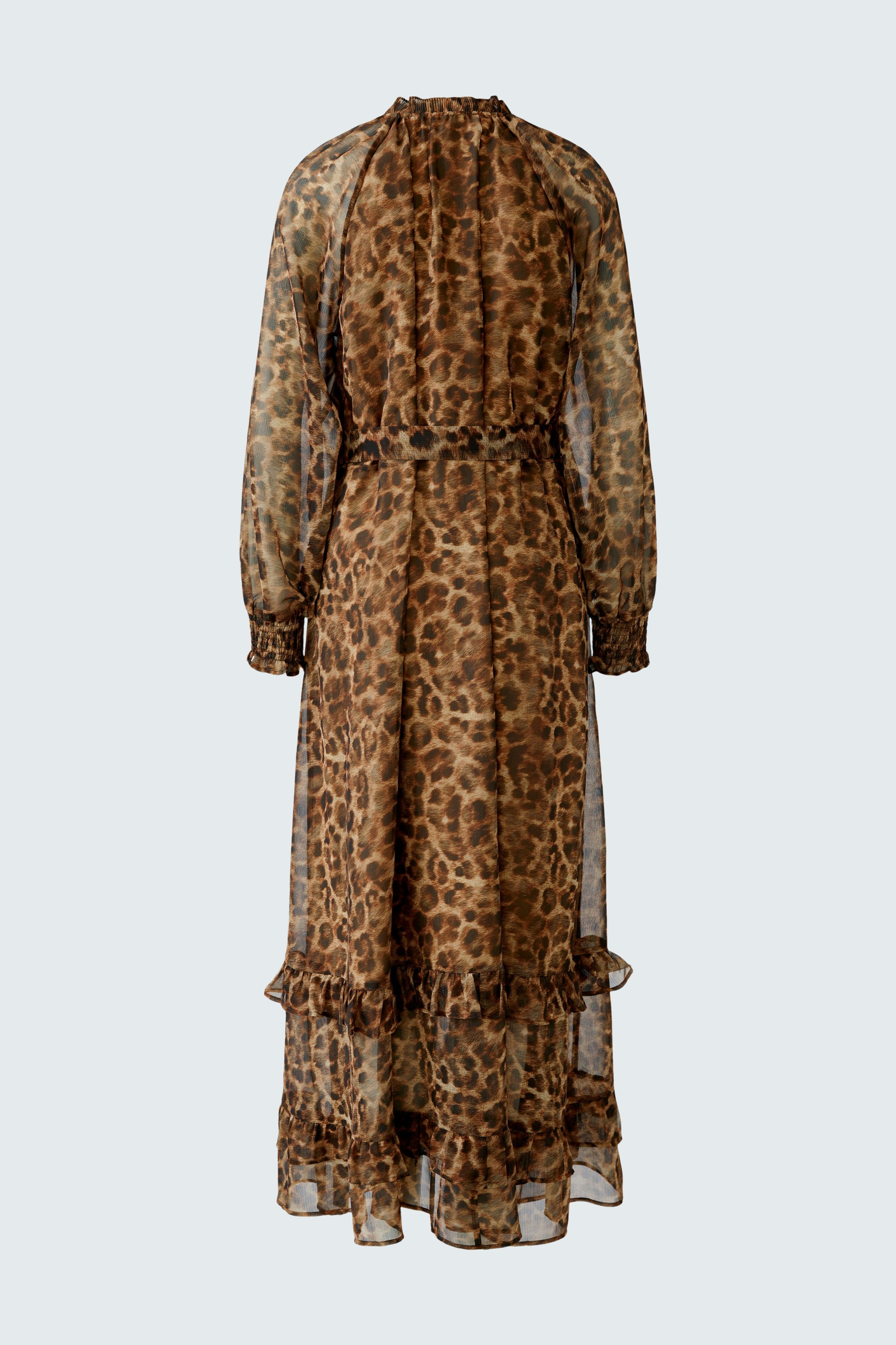 Maxi dress: A woman in a brown leopard print maxi dress with ruffles and long sleeves.