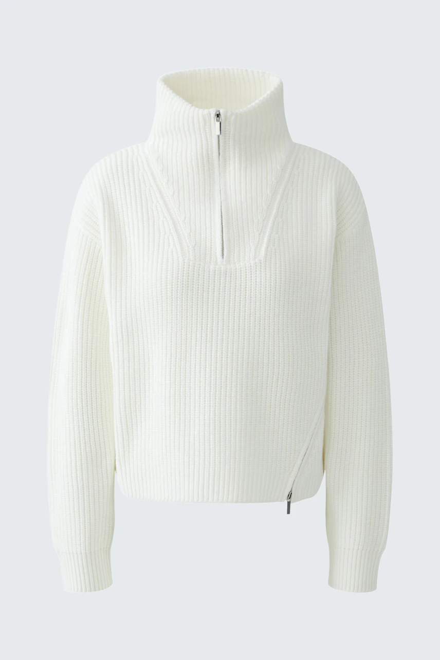 Casual women's pullover: White ribbed pullover with a high collar and zip detail.