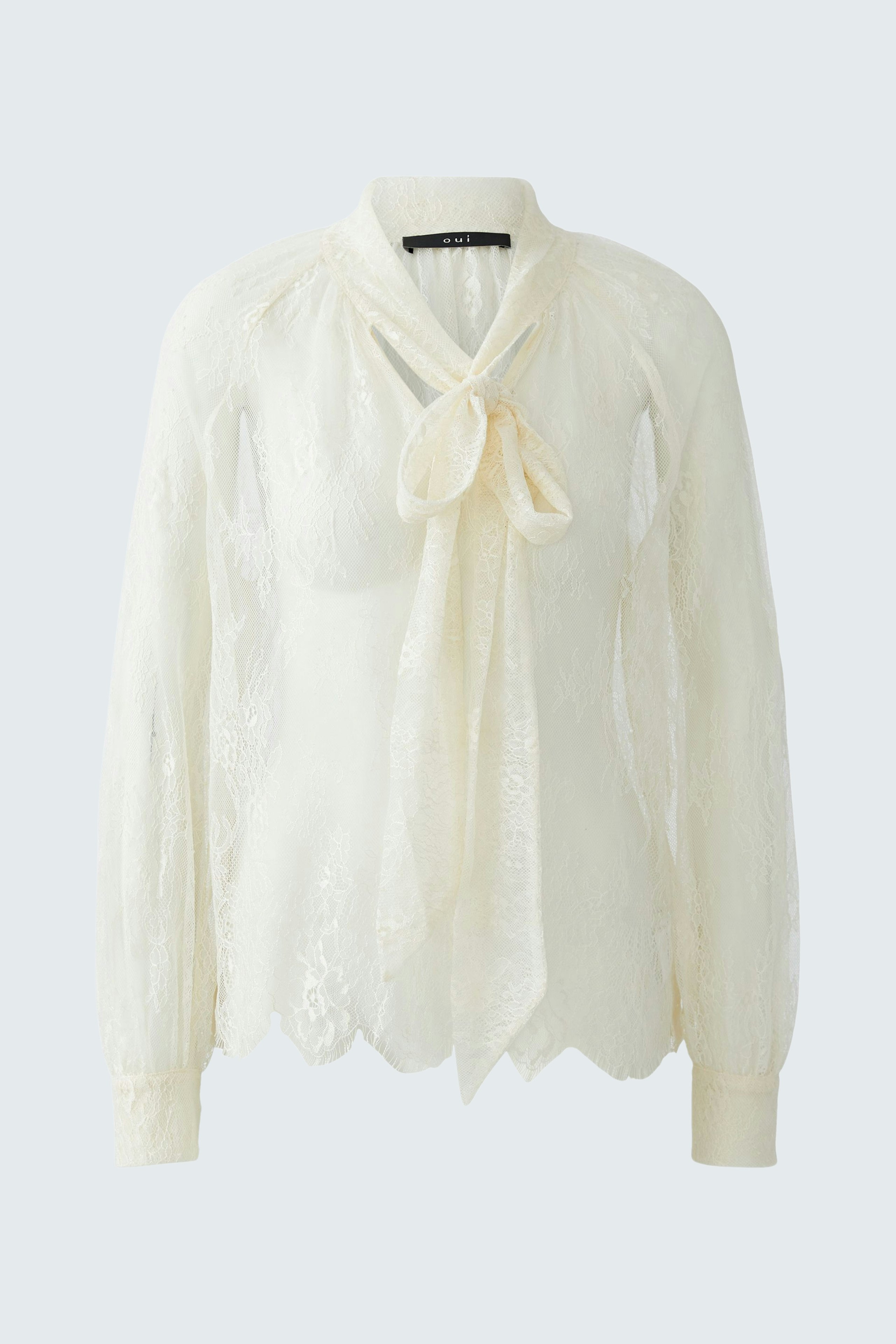 Light cream blouse with a tie detail and lace design, perfect for casual wear.