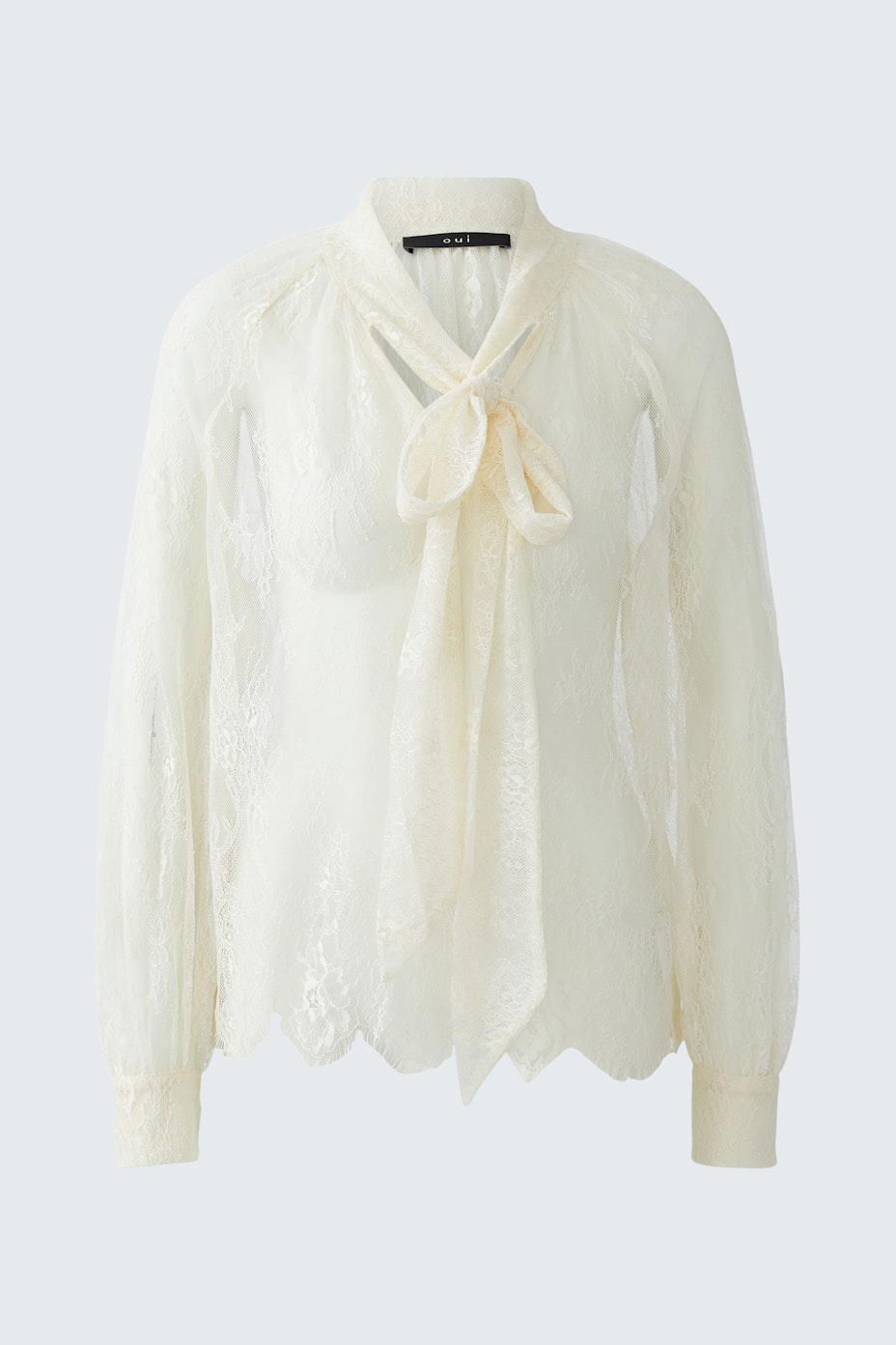 Luftige Damen-Bluse in Creme mit Schleifenkragen und transparenten Ärmeln.