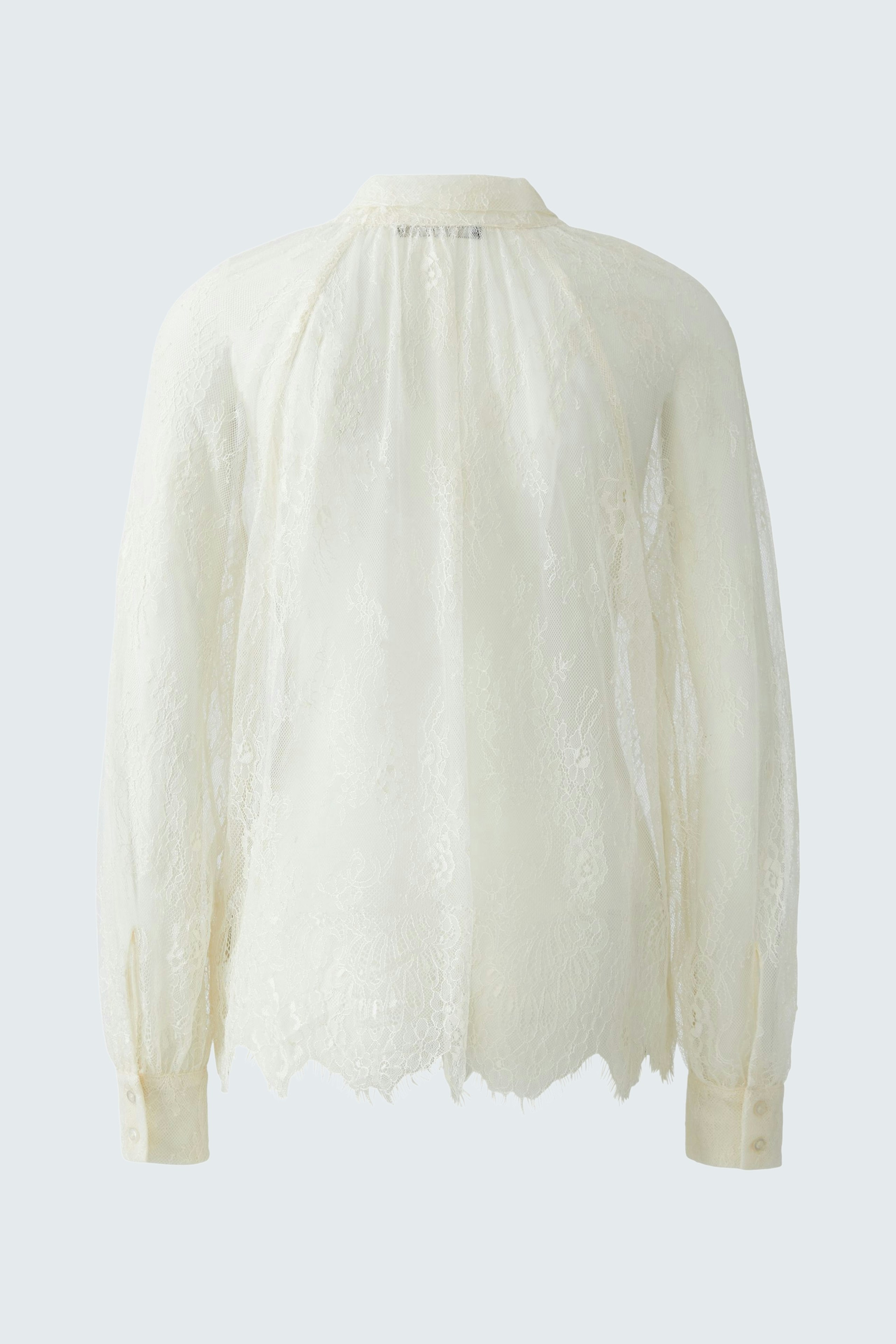 Light cream blouse with lace details and long sleeves, designed for women.