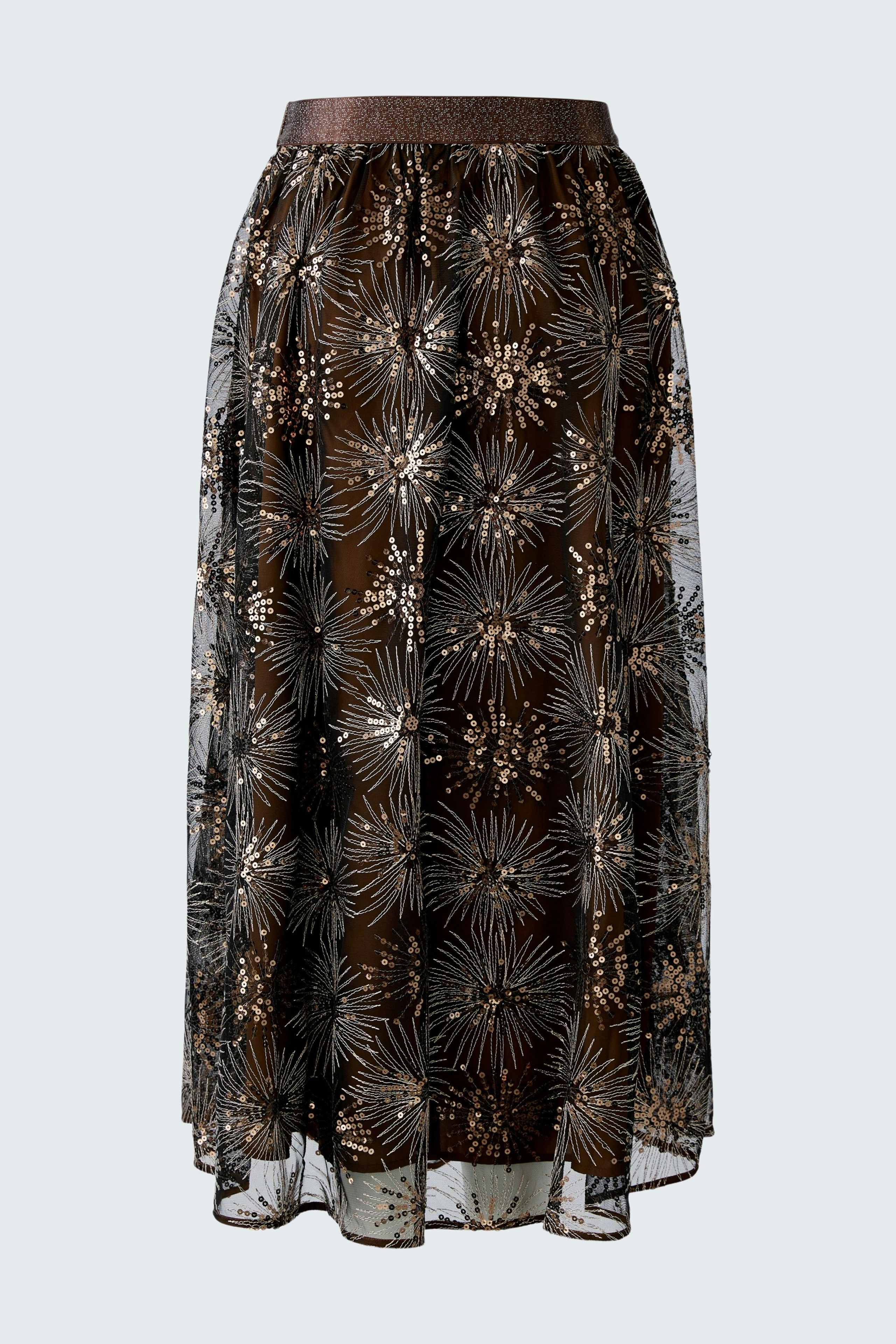 A-line skirt: A woman in a flowy brown skirt with floral patterns, perfect for casual outings.