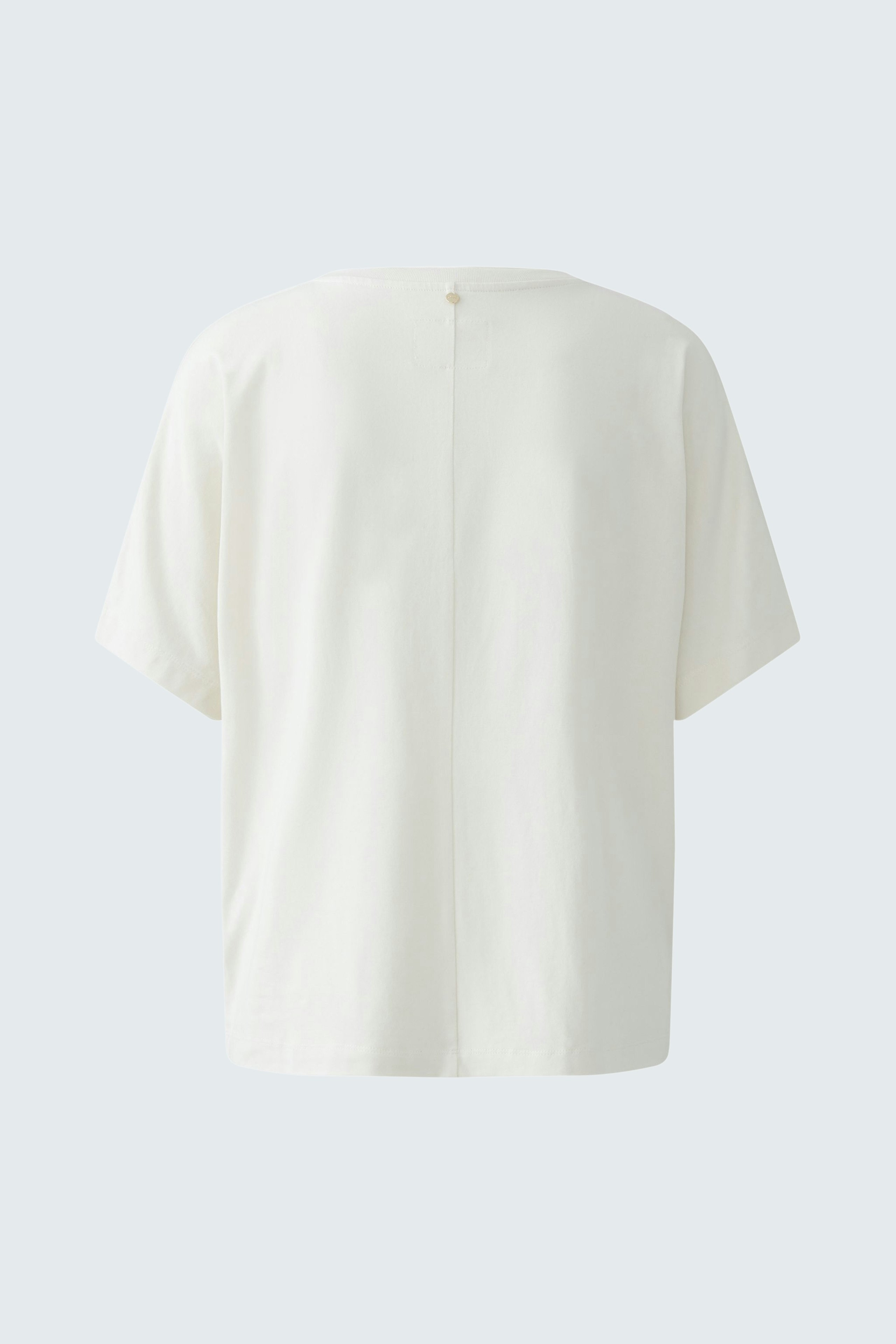Casual women's T-shirt in white with a simple design and back button detail.